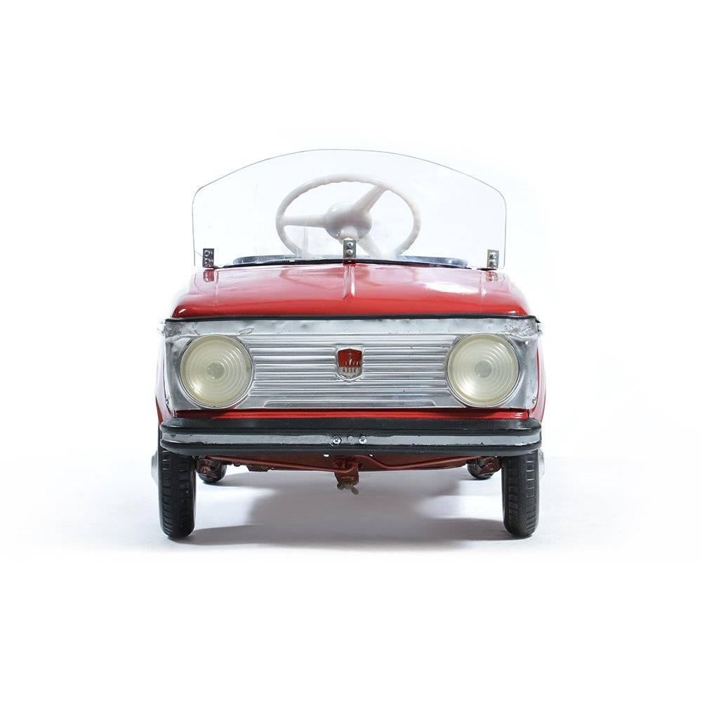 A rare collectible item, this early Soviet Child´s pedal car was considered a great luxury in the communist era in Czechoslovakia. Created as a model for children as a small copy of the original Moskvich car.
Some signs of use visible on the metal