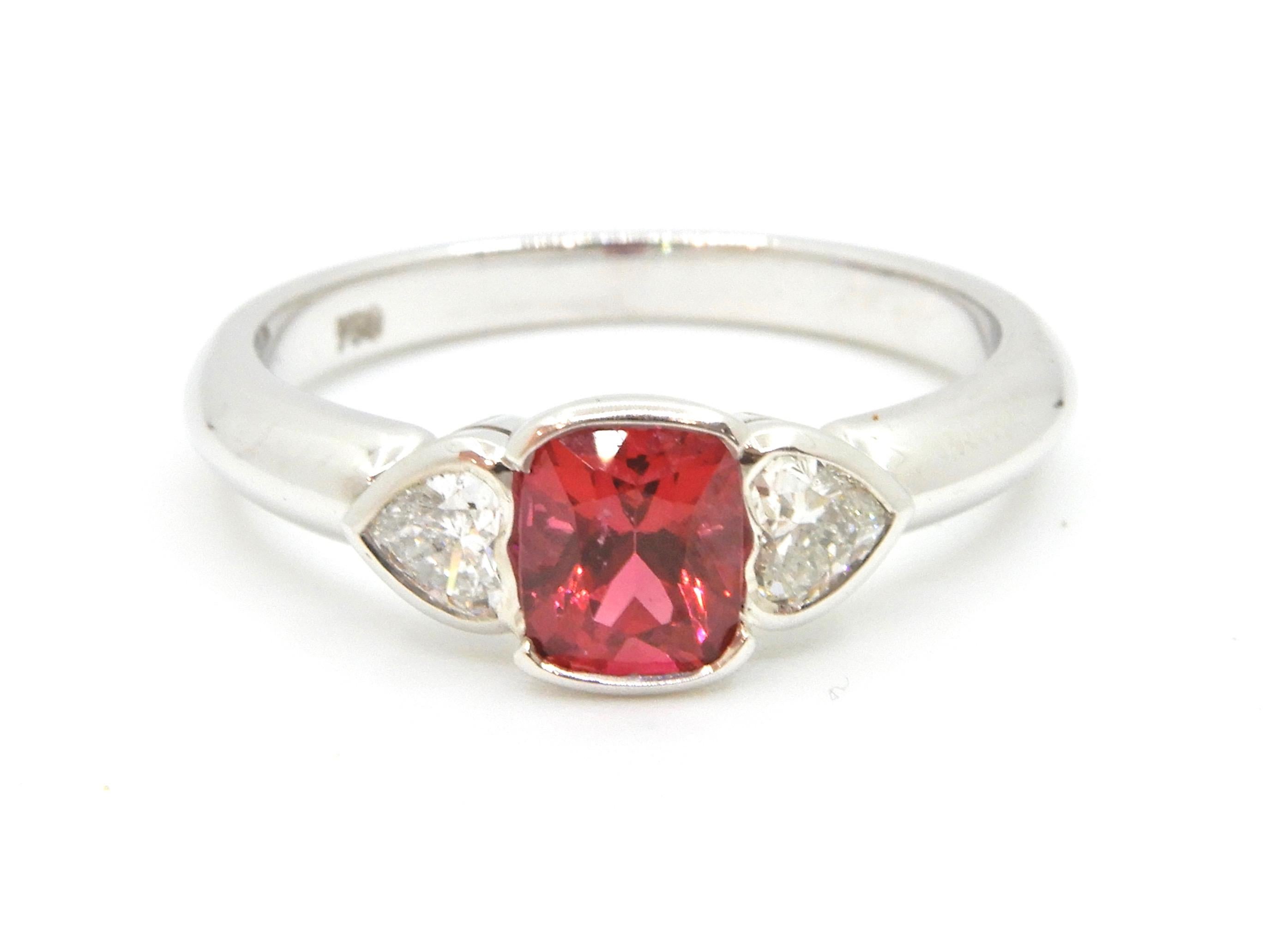 Contemporary Red Spinel and Heart Cut Diamond White Gold Handmade Three-Stone Engagement Ring For Sale