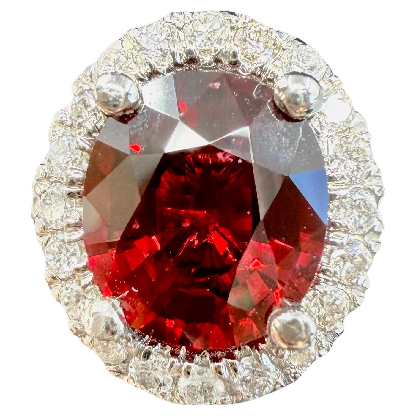 Natural Unheated 2.47ct Oval Red Spinel
Diamond Halo Platinum Ring
Spinel: 2.47 ct  Spinel
Round Diamonds  .50 cts 
White Natural Diamonds H VS 
Size 5
GIA Report #2181558164 July 2017
2.47 cts 
Shape: Oval
8.89 x 7.83 x 4.79 mm
No Heating 
Color: