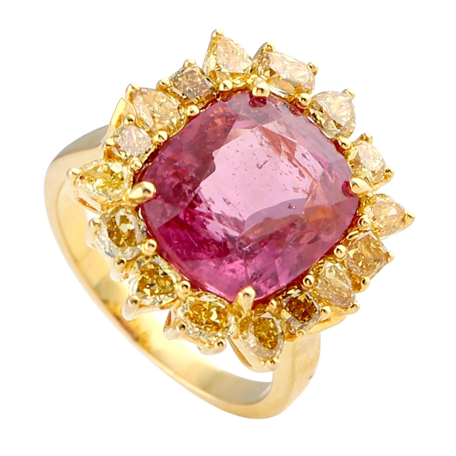 Unique and stylish this cushion shaped red spinel ring with yellow diamonds around in stunningly set in 18K yellow gold.

Ring size: 7 (Can be sized for a cost )

18K Gold: 7.09gms
Spinel: 9.4cts
Diamond: 2.40cts
