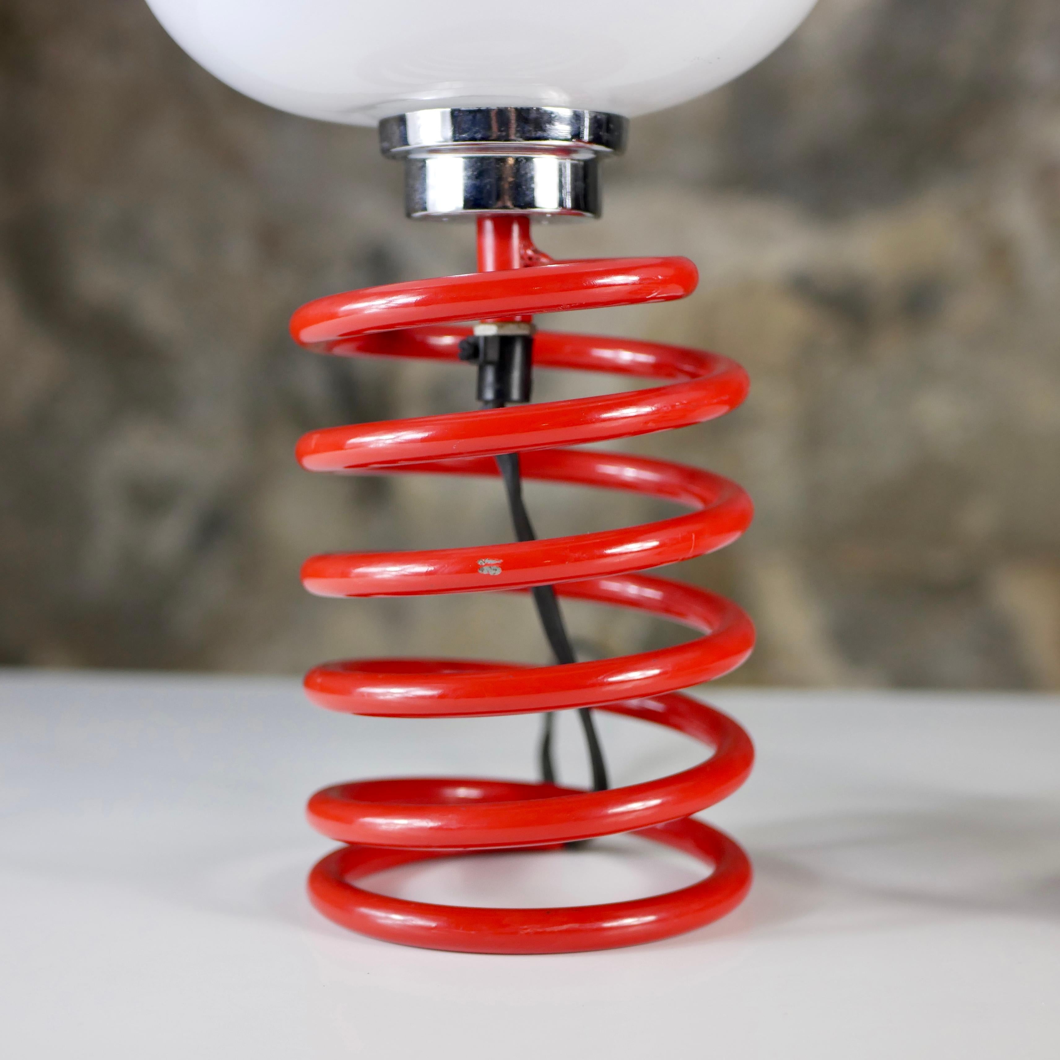 German Red spring table lamp attributed to Ingo Maurer, 1970s For Sale