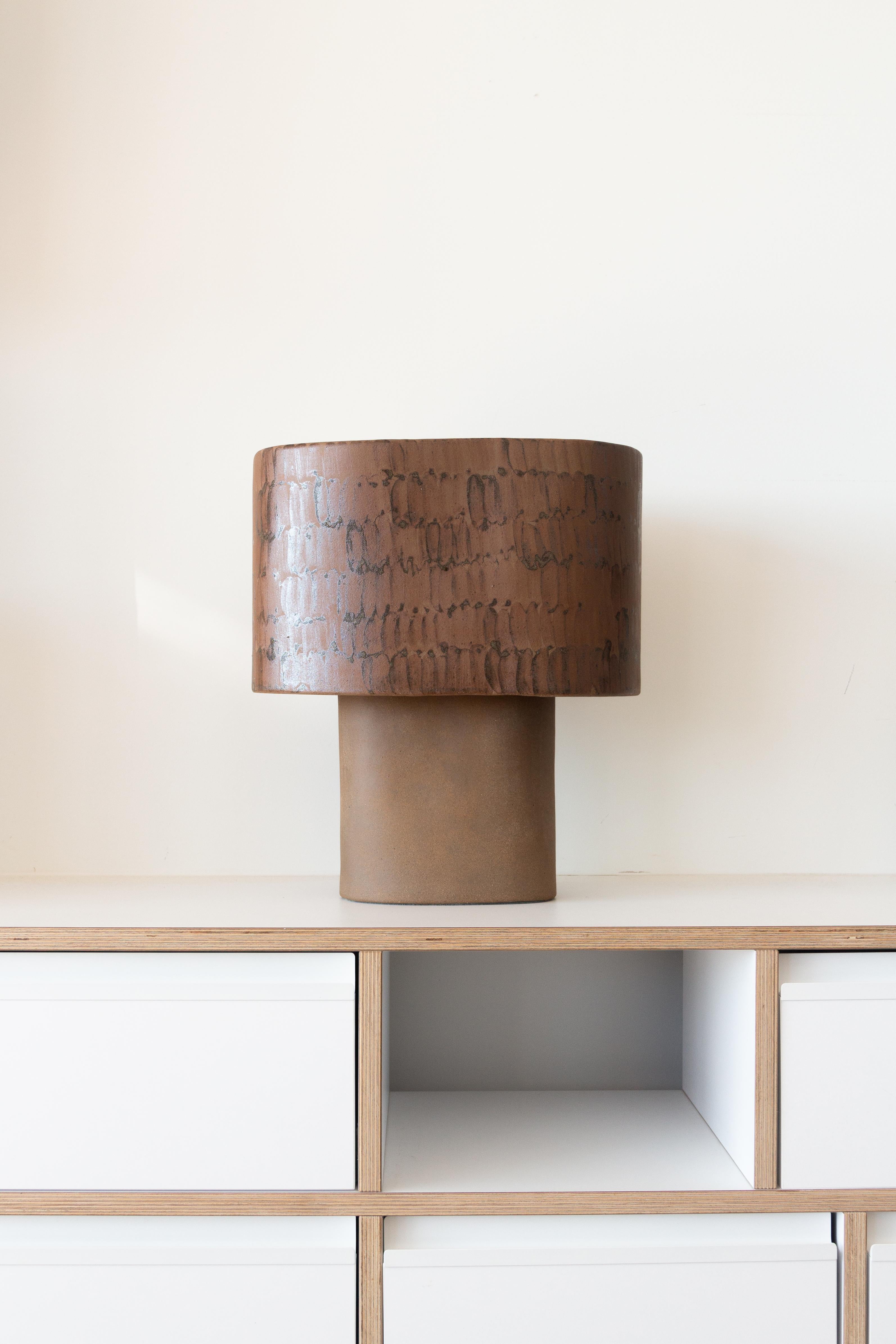 Red Stoneware Table Lamp by Lucas Huillet
Dimensions: D 38 x W 35 x H 38 cm
Materials: Red stoneware and hand painted glaze.
Weight: 8 kg.


Lucas Huillet is an artisan designer.
He bases his practice around the cross-disciplinarity between