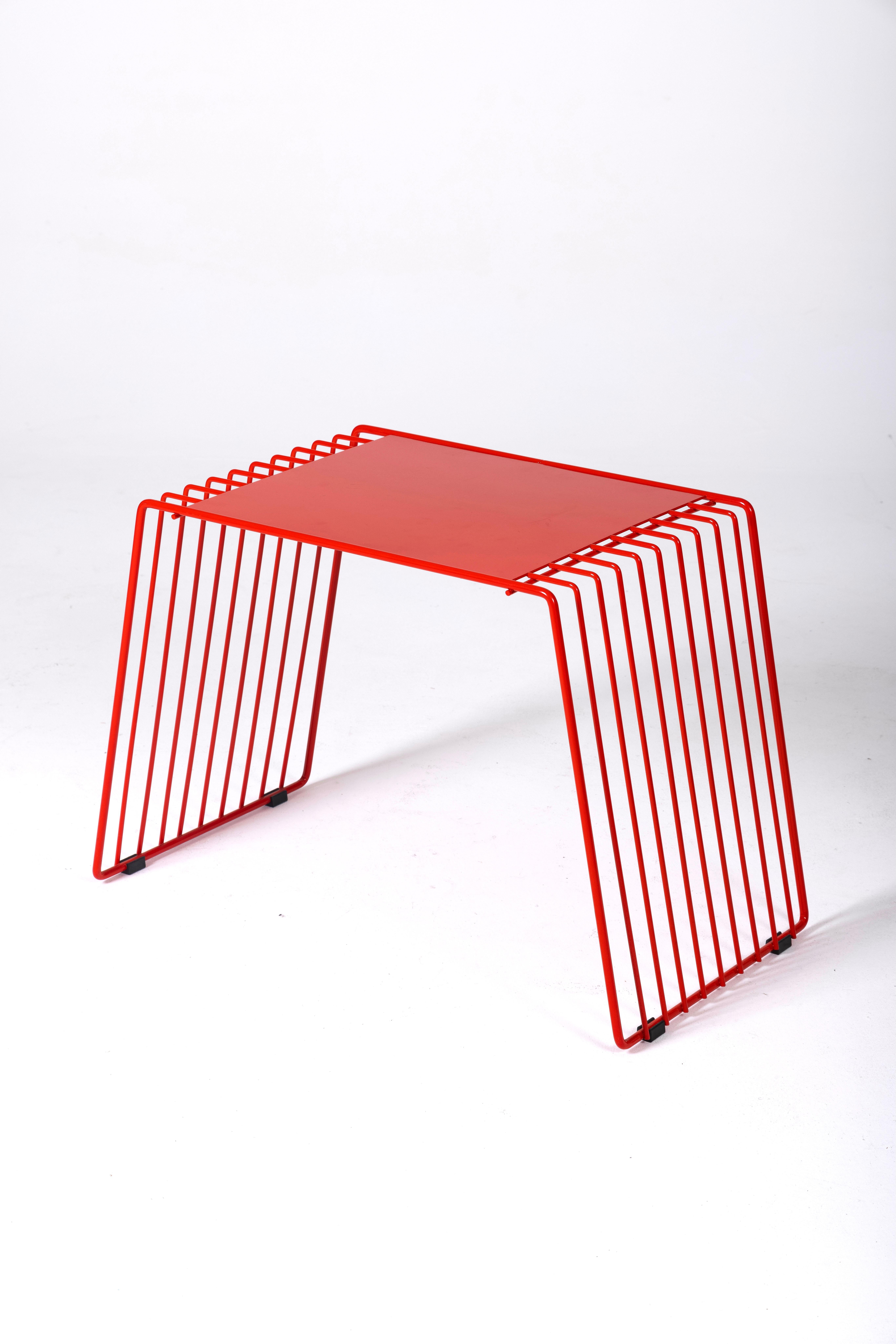 Desk for children by designer François Arnal for Atelier A, contemporary edition. The tubular frame is in red lacquered metal. This stool pairs perfectly with furniture by designers like Bruno Munari, Ettore Sottsass, or Gerrit Thomas Rietveld.
DV187