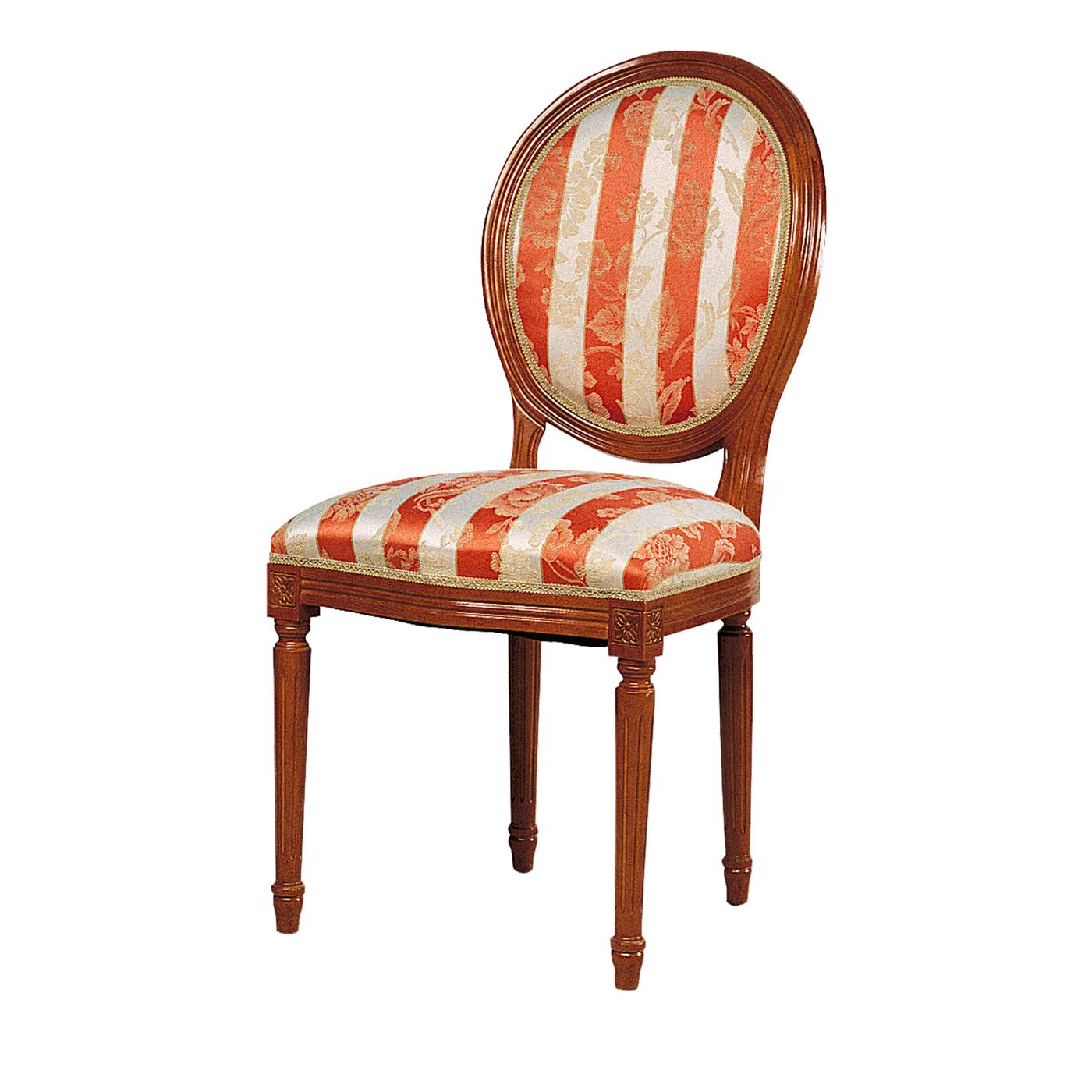 Exuding traditional opulence and an elegant allure, this chair is a superb addition to a Classic interior, where it can be displayed in multiples around a dining table, paired with the version with armrests. Meticulously handcrafted, this chair
