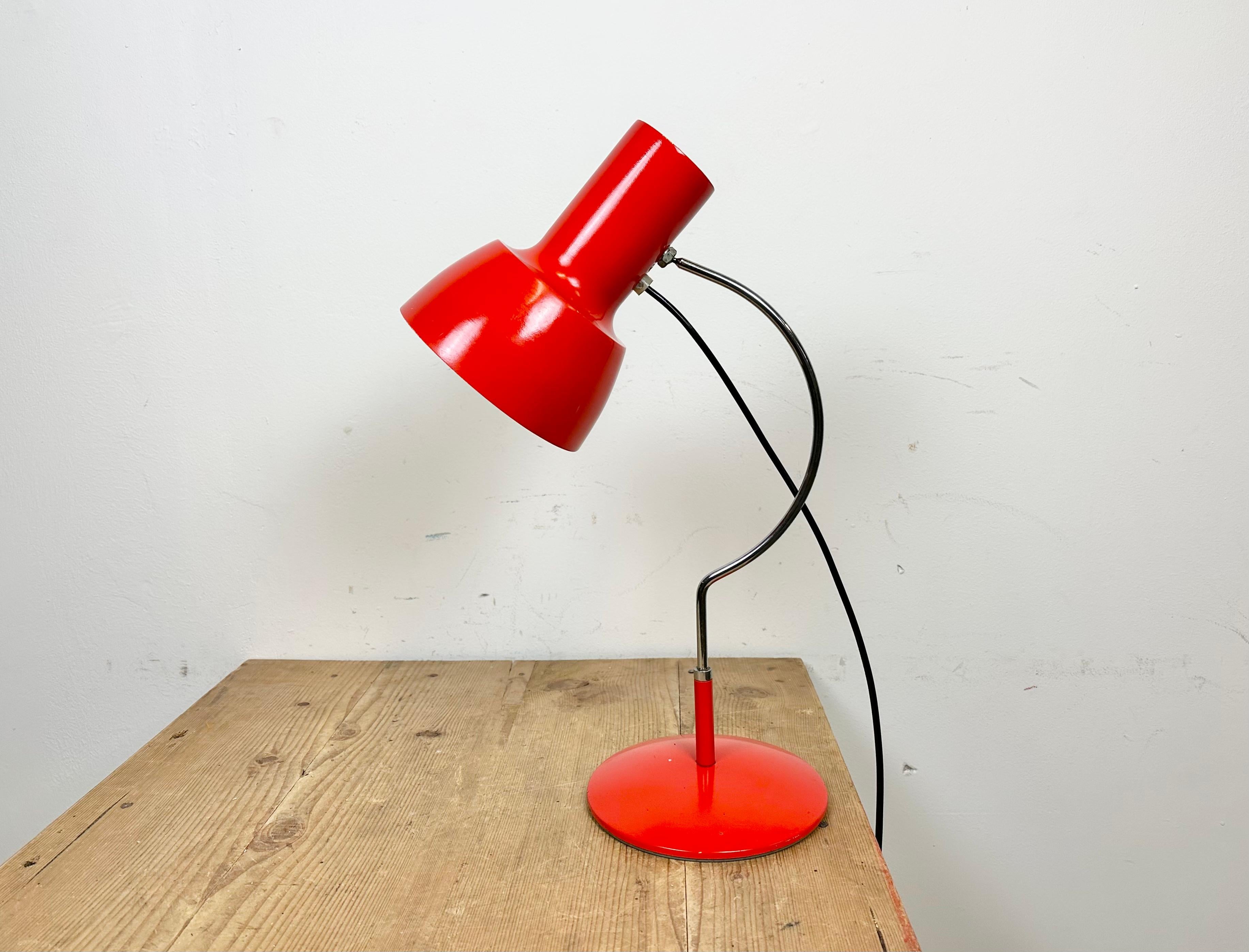 This table lamp, Napako model 1633, was designed by Josef Hurka and produced by Napako in former Czechoslovakia during the 1960s. The lamp has a steel body and an aluminium lampshade.Switch is situated directly on the shade. Good vintage condition.