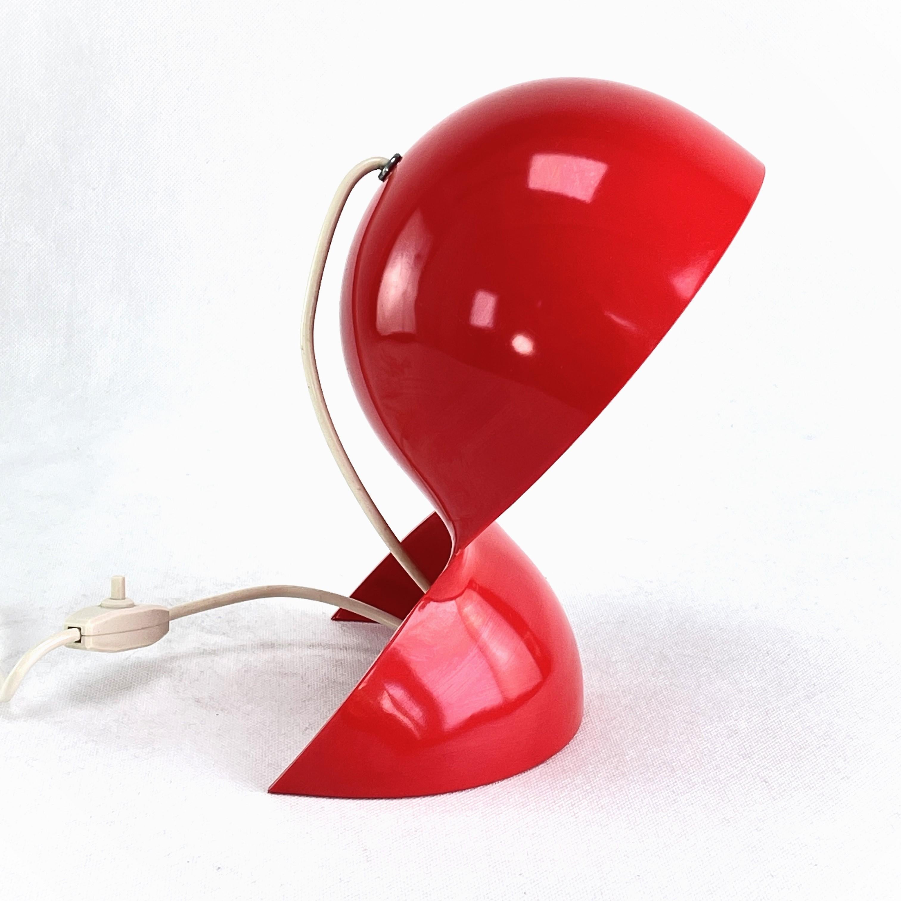 Red Table Lamp from Artemide by Vico Magistretti - 1960s.
The rare lamp is a real design Classic from the 60s. The vintage table lamp is an original from the time.
The 