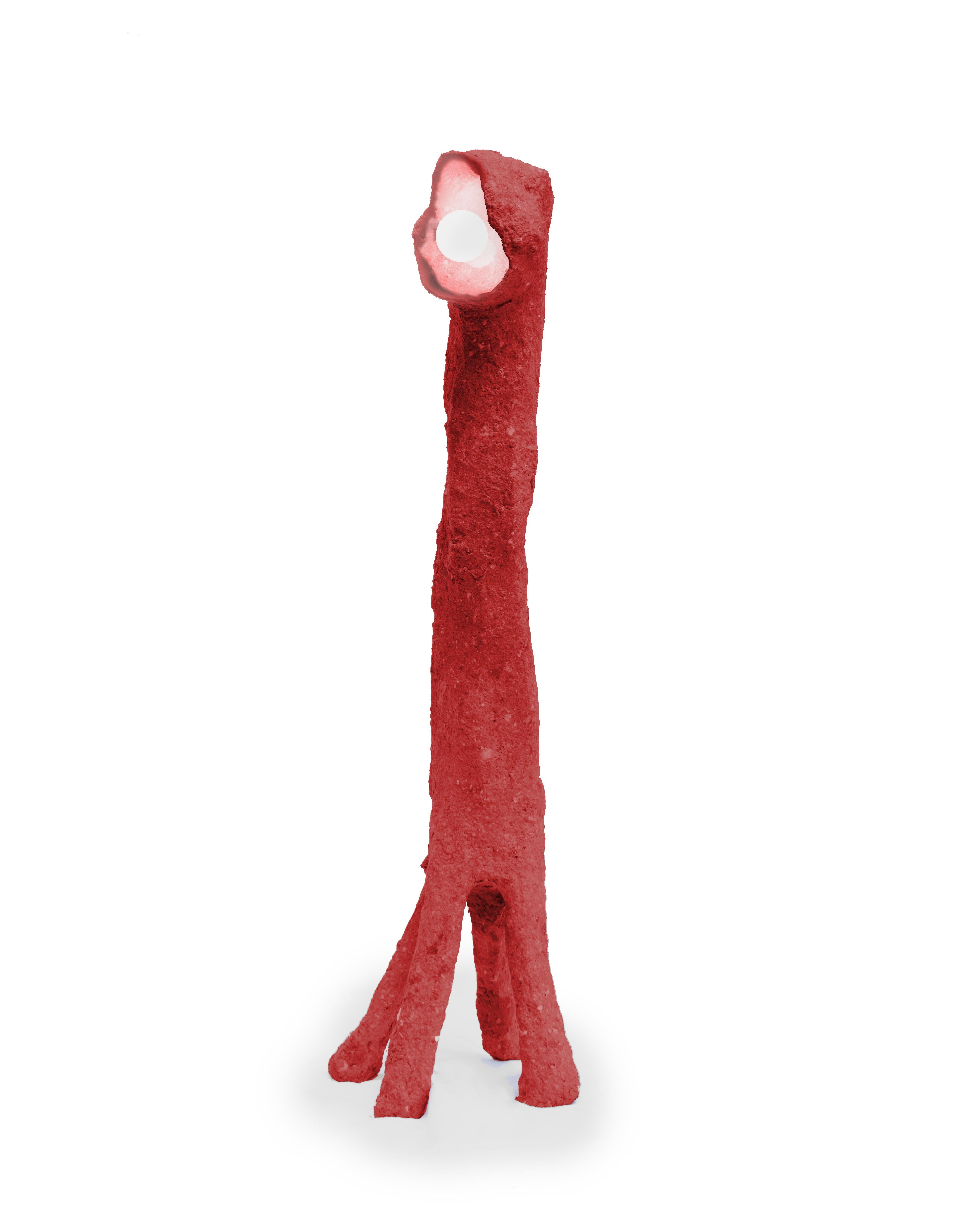 She walked as if she couldn't stand still; that lively red spirit amazed me.
The Quattro Zampe lamp is part of a unique series of objects created from paper waste from the Lucca paper district. These objects aim to populate spaces, not merely
