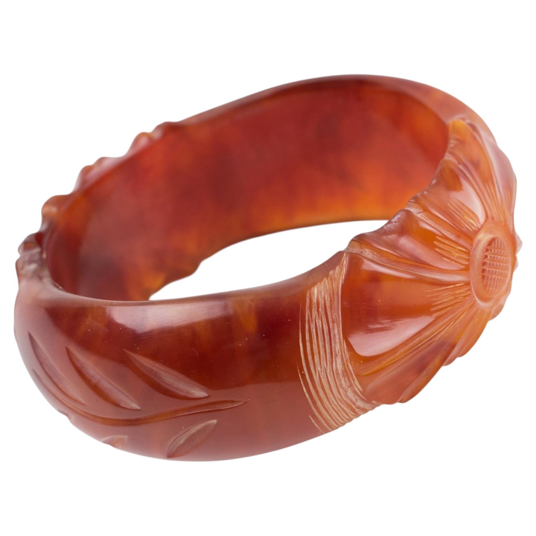 Red-Tea-Amber Bakelite Bangle Bracelet with Floral Carving