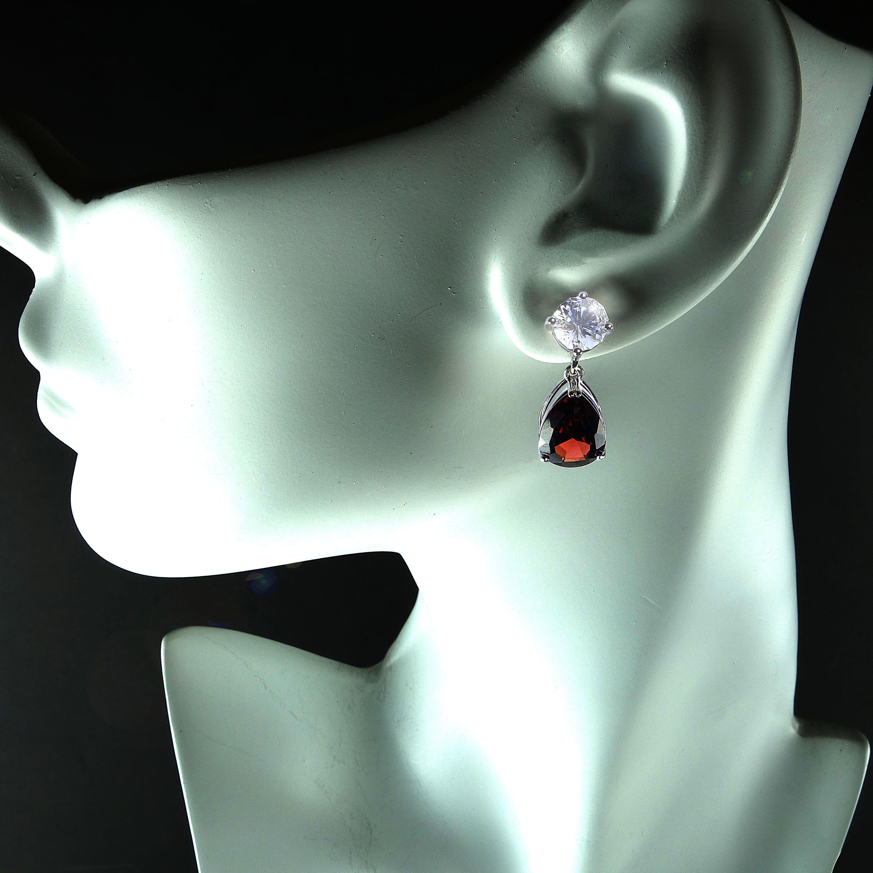 Handmade, sparkling White Danburite Studs with dangling red Garnets Earrings. Glorious Garnets swinging from these flashing Danburites are an unbeatable combination! This stunning pair of garnets were secured from one of our favorite suppliers up in