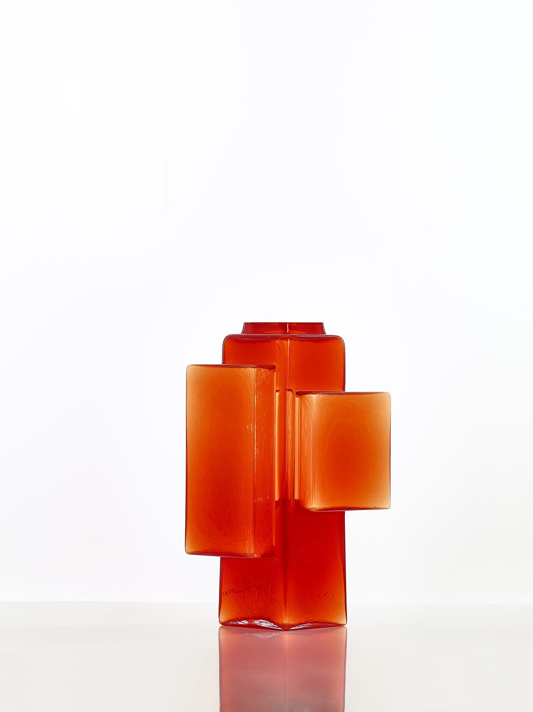 Red Tetris vase by Dechem Studio.
Dimensions: D 30 x W 23 x H 60 cm.
Materials: glass.
Available in smoke grey, cobalt blue, red, crystal and alabaster white.

Strict geometric and architectural lines contrast with the organic and natural