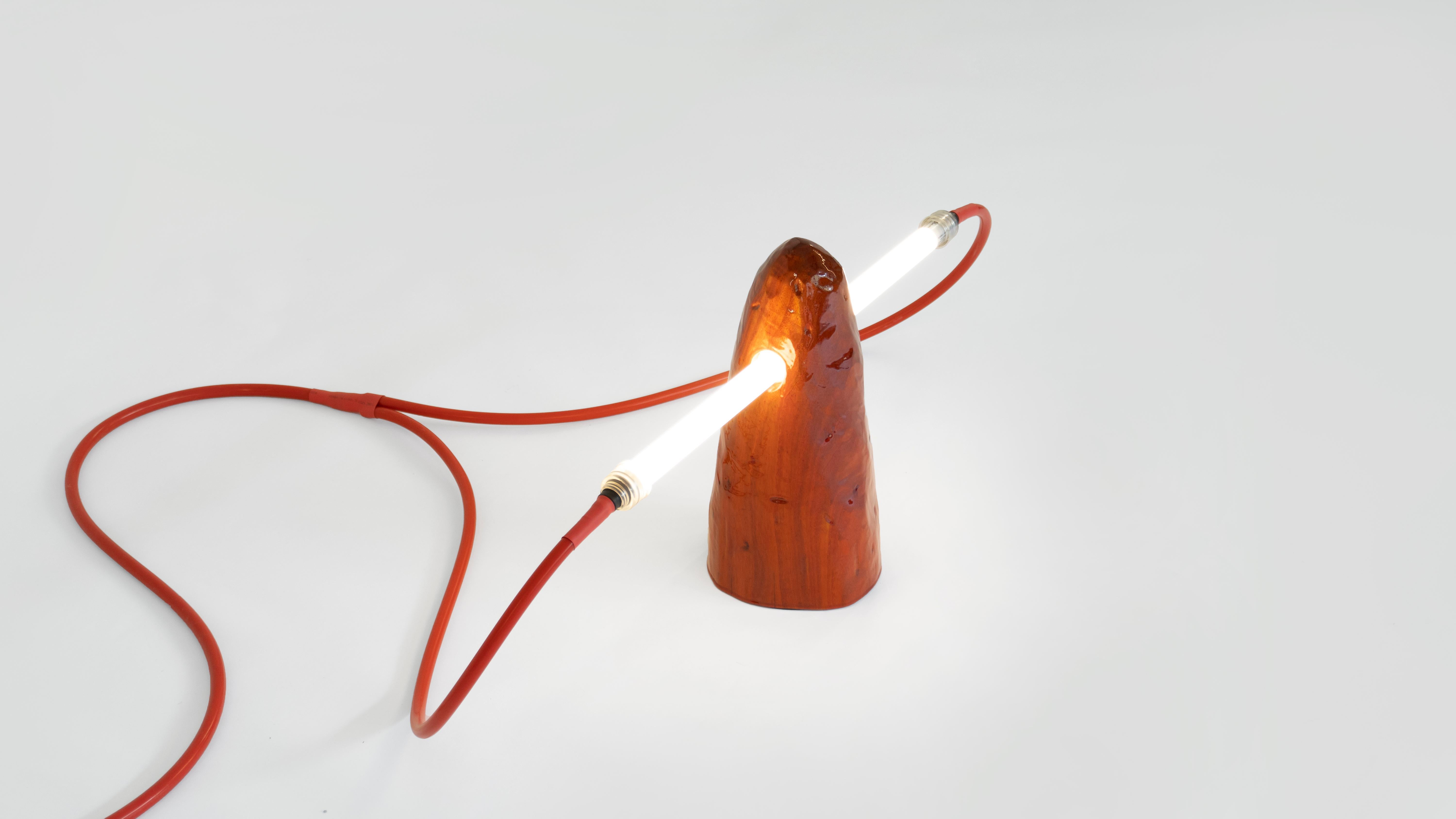 Three Spike Table Lamp by Henry D'ath
Dimensions: D 90 x W 15 x H 35 cm
Materials: Wood.
Available finishes: natural, black ink, clear red gloss. 


Henry d’ath is a New Zealand-born, Hong Kong-based artist and architect. 
Using predominantly
