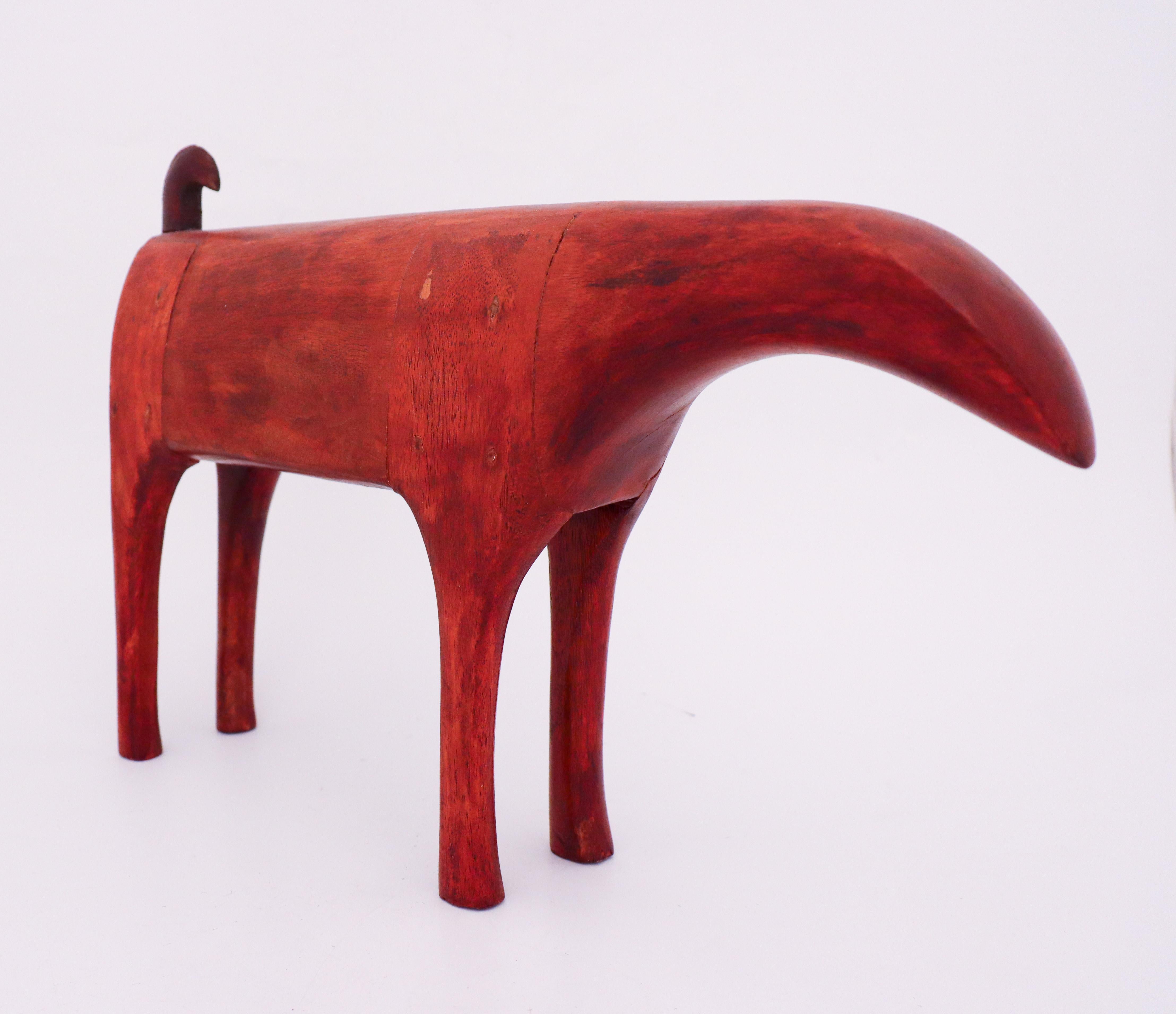 A lovely wooden sculpture designed in Sweden in the midcentury. It is in very good condition except from that one of its legs is repaired. The designer is unknown.