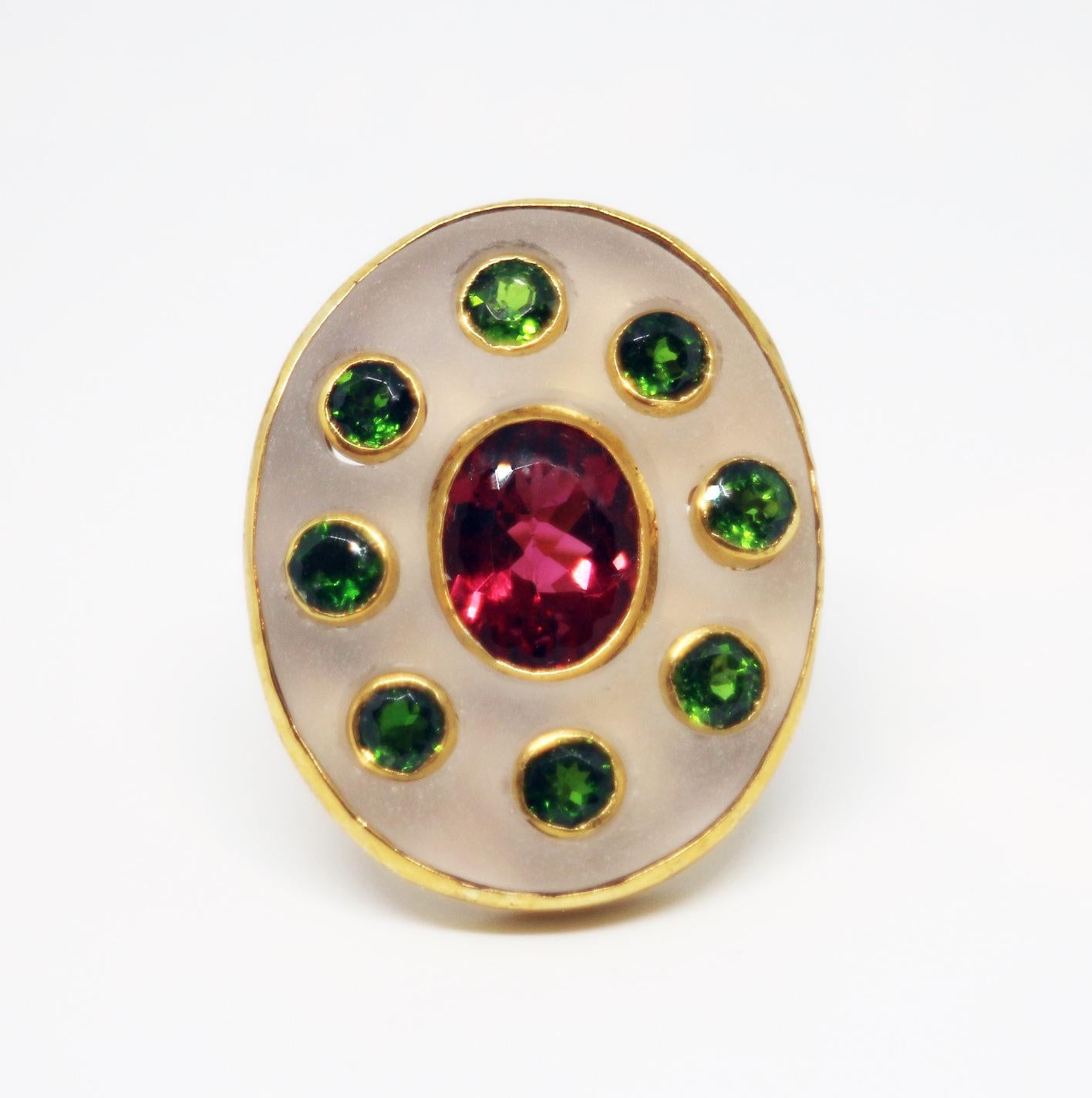 This modern handmade ancient style contemporary bronze and 18K yellow gold ring, set with hand-carved rock crystal and natural chrome diopside and highest quality of natural red tourmaline is from MAIKO NAGAYAMA's Haute Couture Collection called