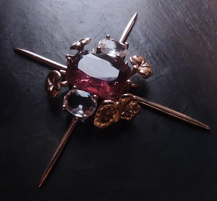 The center of this 18 karat yellow gold contemporary brooch is oval red tourmaline, 8,14 carats, 6,5x12,9 mm. Side gems are oval morganites. 

This item will be custom made with a new gem that is attached, as a copy of the first star that was