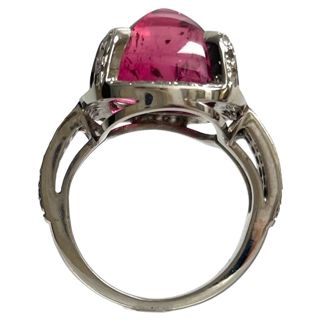 Description
Your luxurious style is reflected in this voluptuous vibrant velvety sugarloaf-cut 8.75 carat Red Tourmaline, showcased with 0.33 carats pave diamonds to elegantly complement any of your selected ensembles for your daytime luncheons or