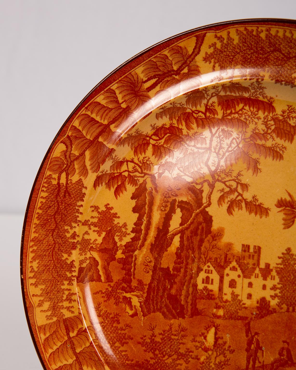 Two ‘Bisham Abbey’ Pattern dishes with rich, red printing on a chalcedony ground. Made by Davenport the dishes date from the early 19th century, circa 1810. The red transfer on the chalcedony ground is quite intense. The two dishes are a matching