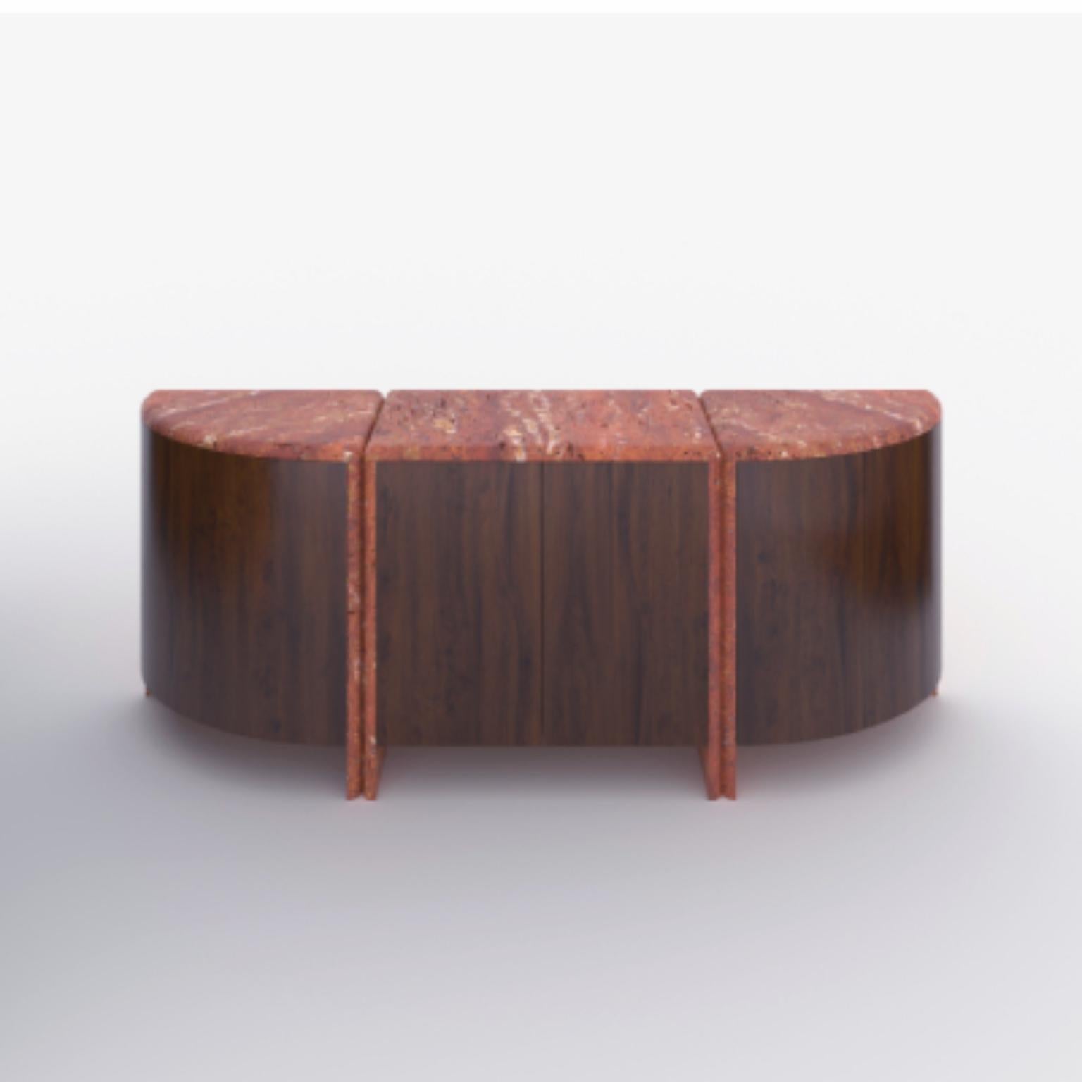Red Travertine And Walnut Lily Credenza by Fred and Juul
Dimensions: D 43 x W 202 x H 78 cm.
Materials: Red travertine and walnut.

Fred&Juul, short for Federico Minarelli and Julie Janssen, are two architects who decided to work as architects isn’t