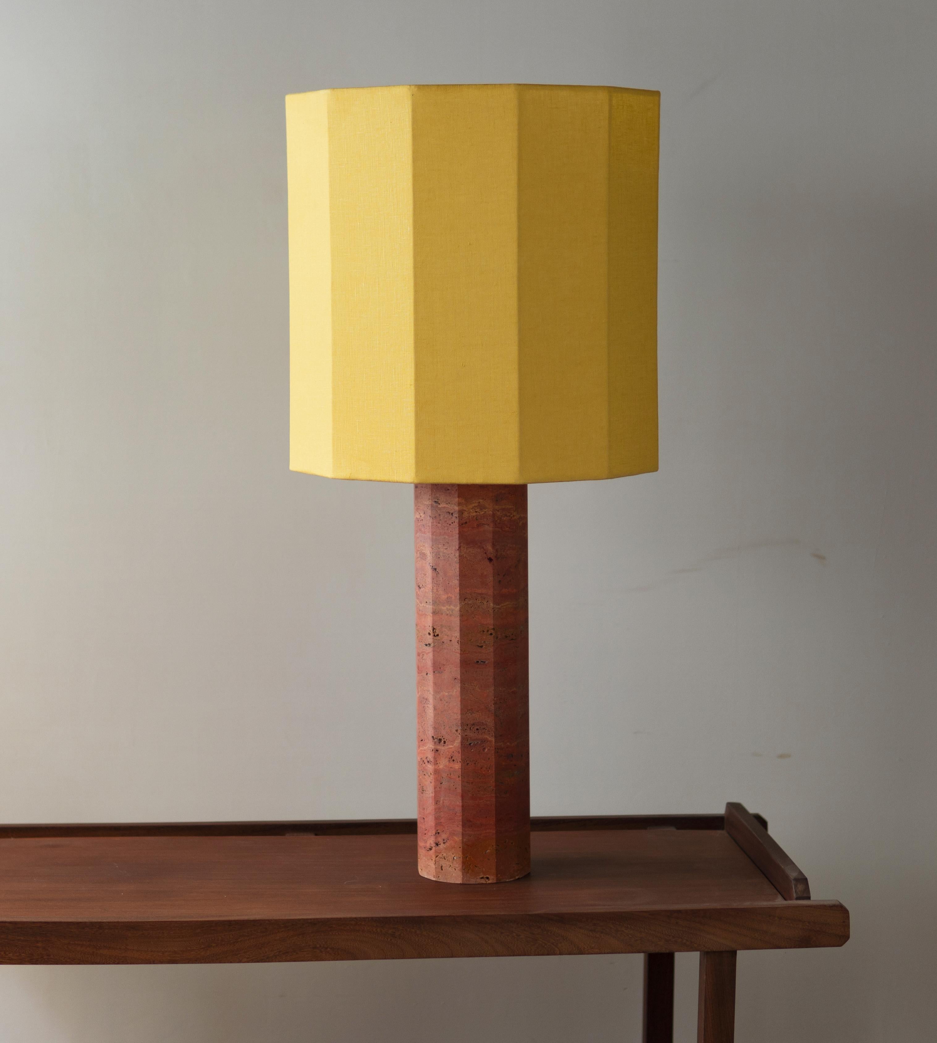Red Travertine Large Roma II Dodecagon Table Lamp by NASSI
Dimensions: W 40 x D 40 x H 85 cm. 
Materials: Fine cotton lining, pure linen fabric in yellow. 
Base: Red Travertine, nickel plated brass. 
Weight: 17 kg

Also available in 4 colors (white,