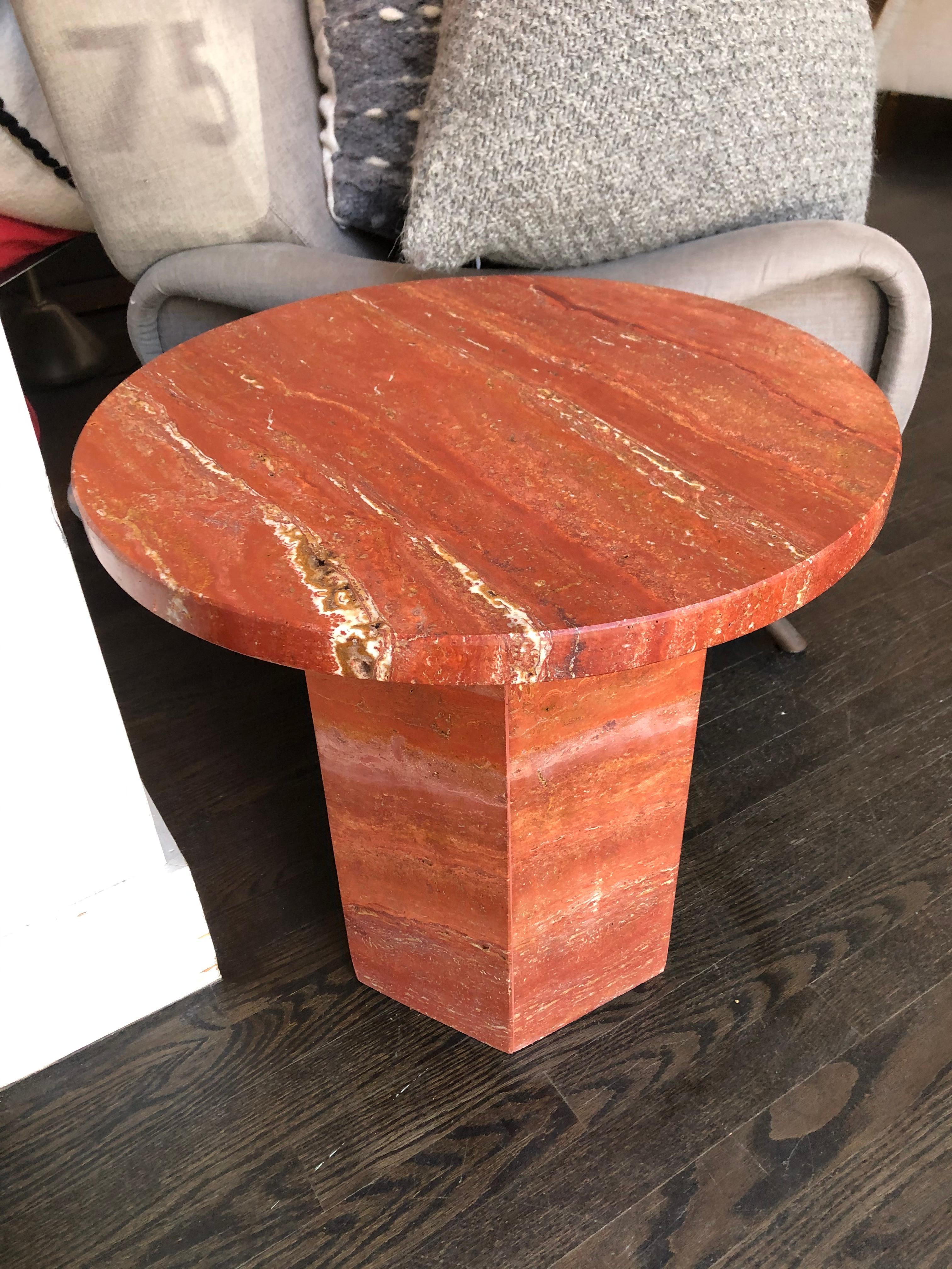 Red travertine marble side table by Le Lampade
Designed and Made in Italy
Round travertine top on an hexagonal bae.
Base and top can be custom made up on request.
