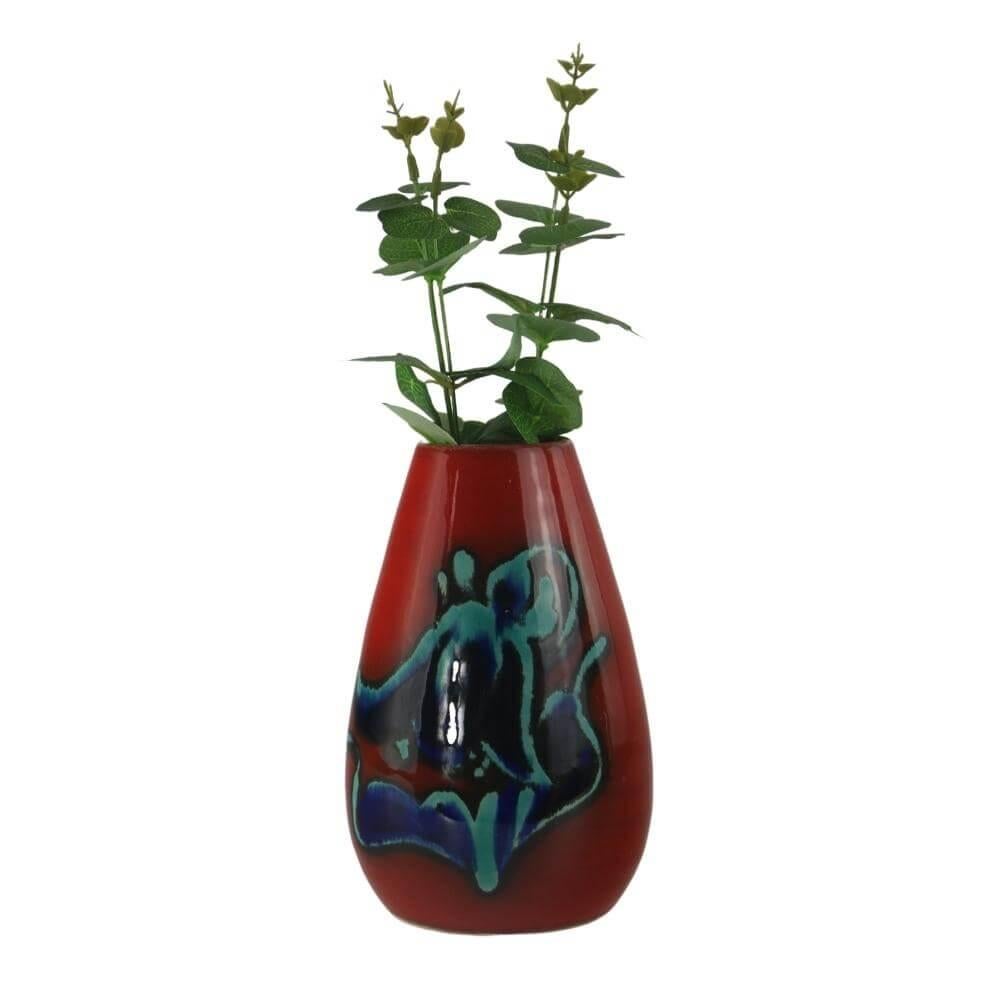 Beautiful red glazed ceramic vase with hand painted abstract turquoise and cobalt blue decor. Manufactured in Bavaria in the 1970s by Allgäuer Keramik Hans Rebstock in Altstädten. Excellent condition! No cracks or hairlines on it. Marked piece.

In