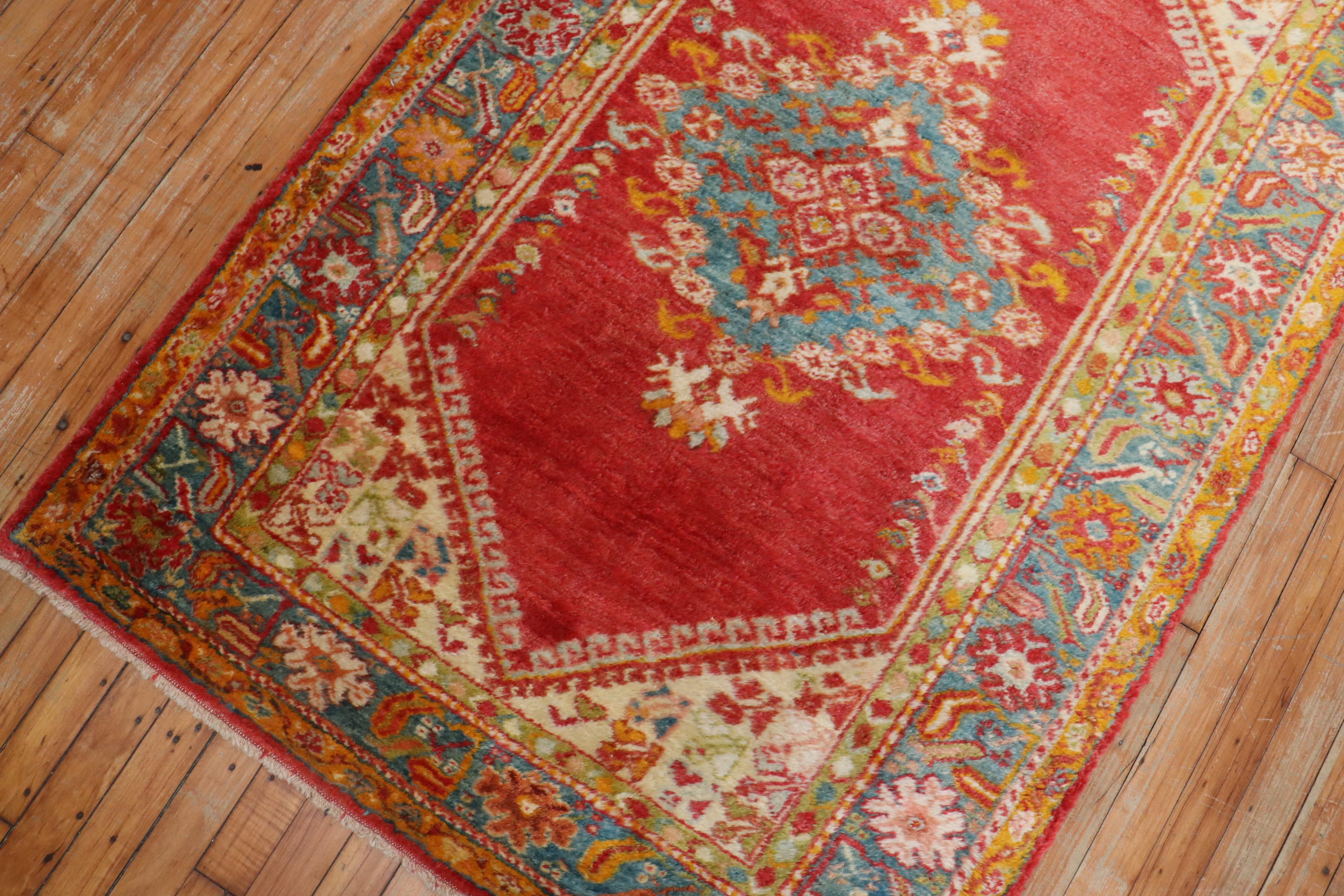 red and turquoise rug
