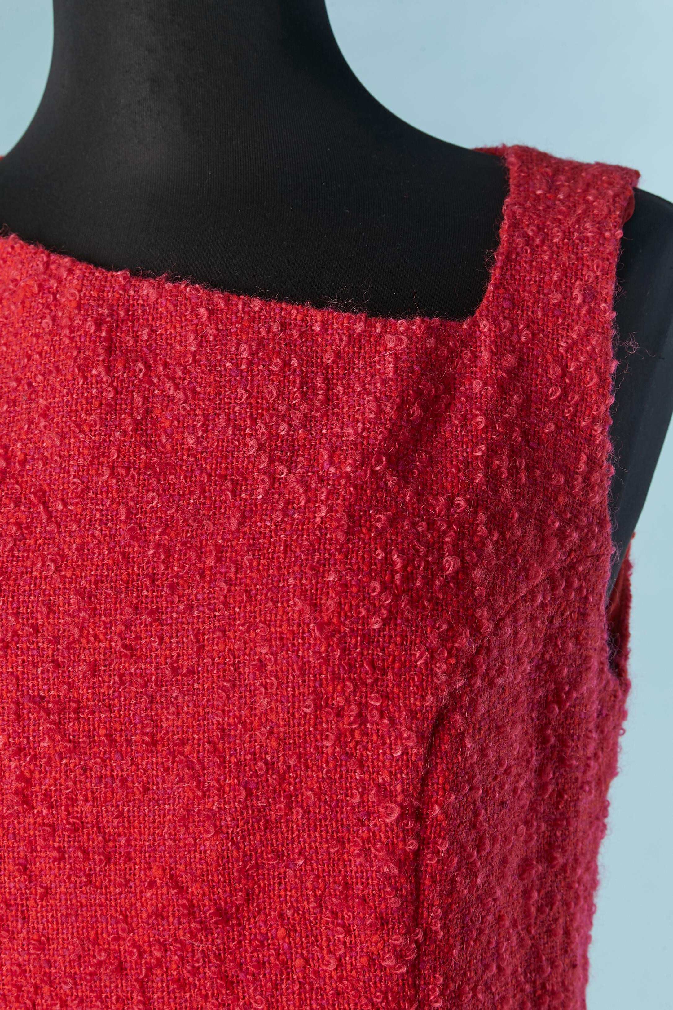 Red tweed bouclette sleeveless dress. 
ain fabric: 77% wool, 23% mohair. Lining: rayon
Zip in the middle back. Cut-work . 
Authenticity hologram. 
SIZE 48 (It) 44 (Fr) 12 (Us) L 