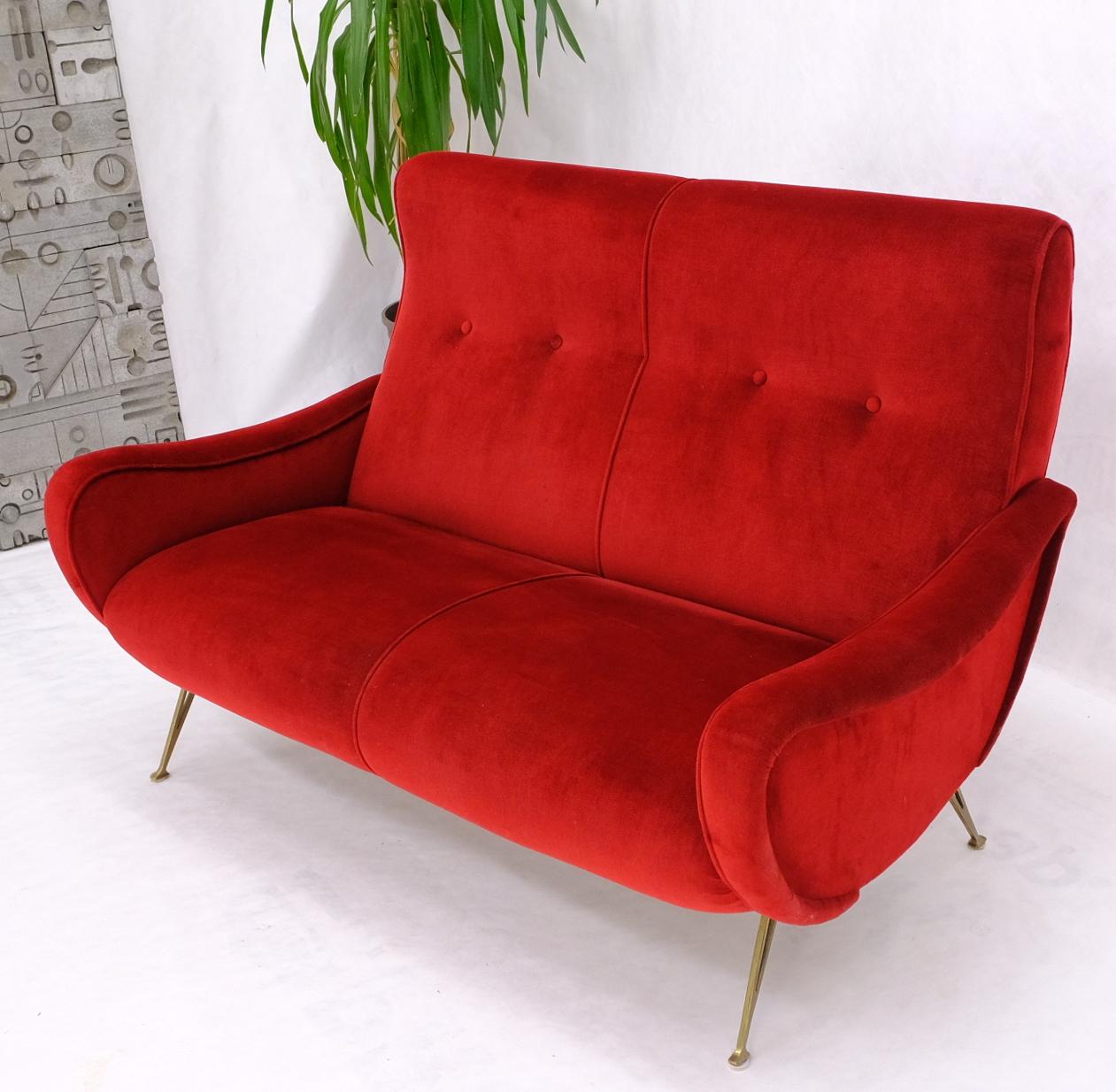 Mid century Italian modern brass sputnik shape legs bright red upholstery sofa.