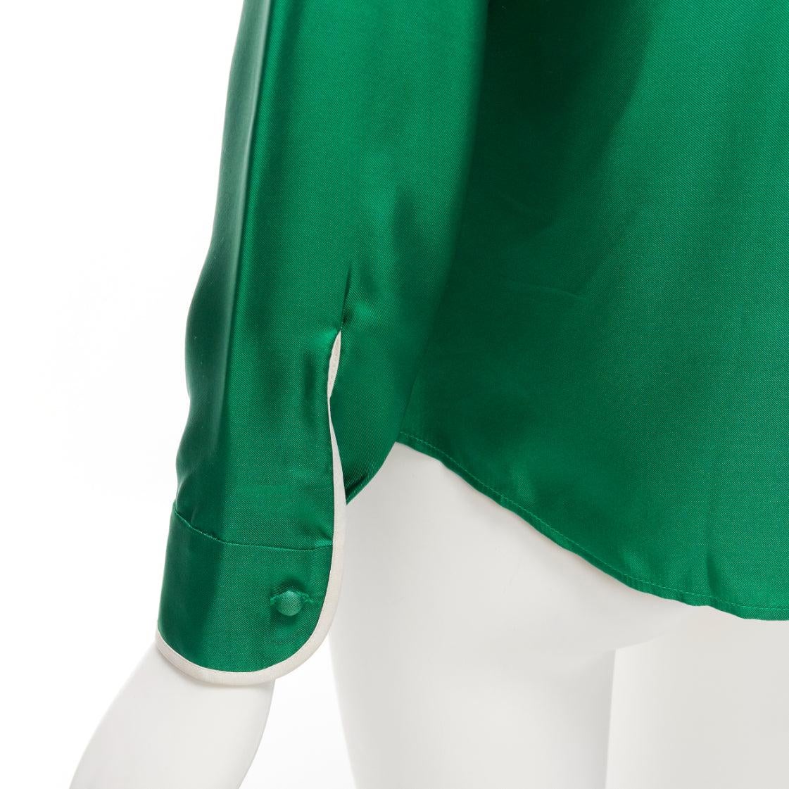 RED VALENTINO 2022 100% silk green bow tie Peter Pan blouse shirt IT38 XS
Reference: AAWC/A00740
Brand: Red Valentino
Collection: 2022
Material: Silk
Color: Green, White
Pattern: Solid
Closure: Button
Extra Details: Hoop design at back for neck