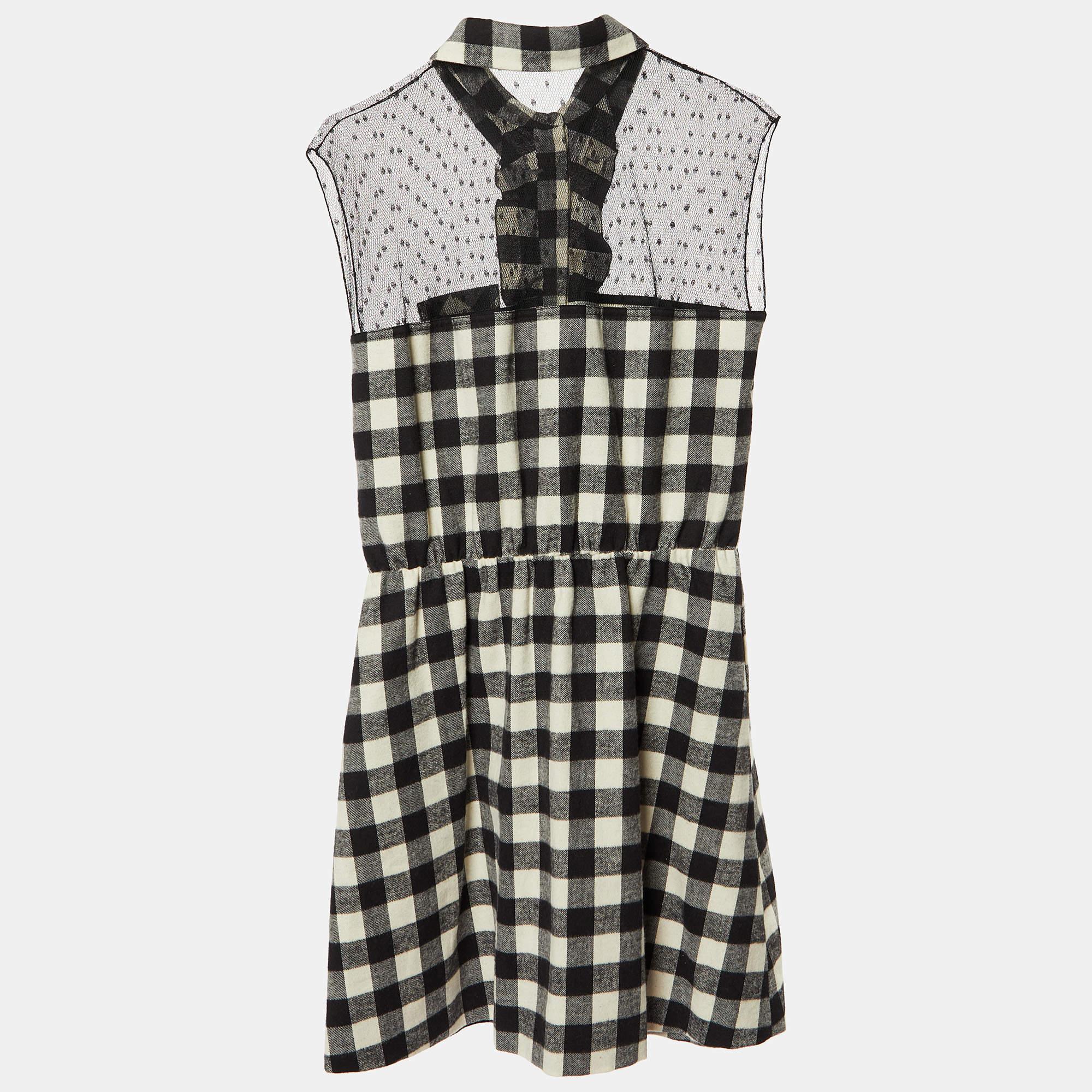 This designer dress is a chic and stylish garment that exudes elegance and sophistication. With its sleek design flattering silhouette and high quality craftsmanship this dress is perfect for any special occasion or evening event ensuring you stand