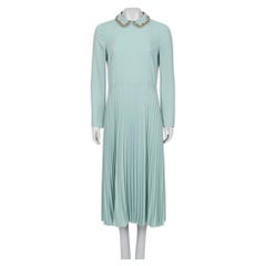 Vestido midi negro de Red Valentino con bajo plisado, talla S, manga larga