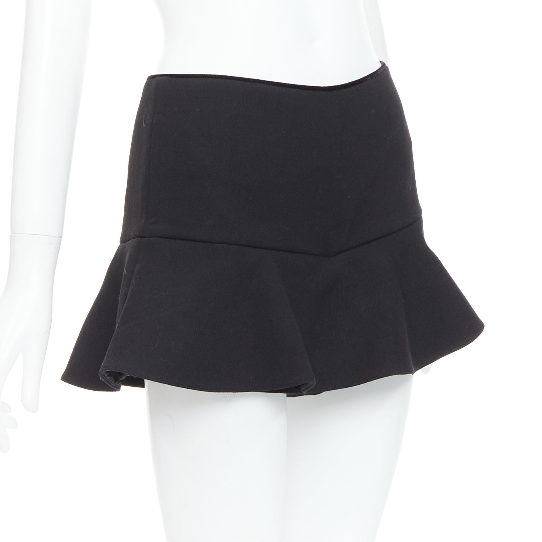 RED VALENTINO black ruffle hem skort shortsIT38 XS
Reference: CNLE/A00388
Brand: Red Valentino
Material: Polyester, Blend
Color: Black
Pattern: Solid
Closure: Zip
Lining: Black Fabric
Extra Details: Back zip.
Made in: Romania

CONDITION:
Condition: