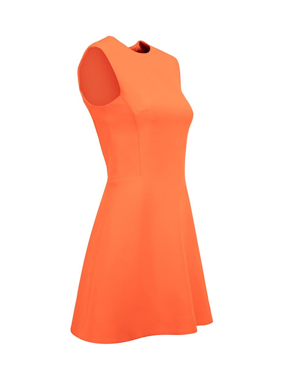 CONDITION is Very good. Minimal wear to dress is evident. Minimal tarnishing to zip hardware and minor pilling to lining on this used Victoria Beckham designer resale item.



Details


Orange

Silk

Mini dress

Round neckline

Sleeveless

Back