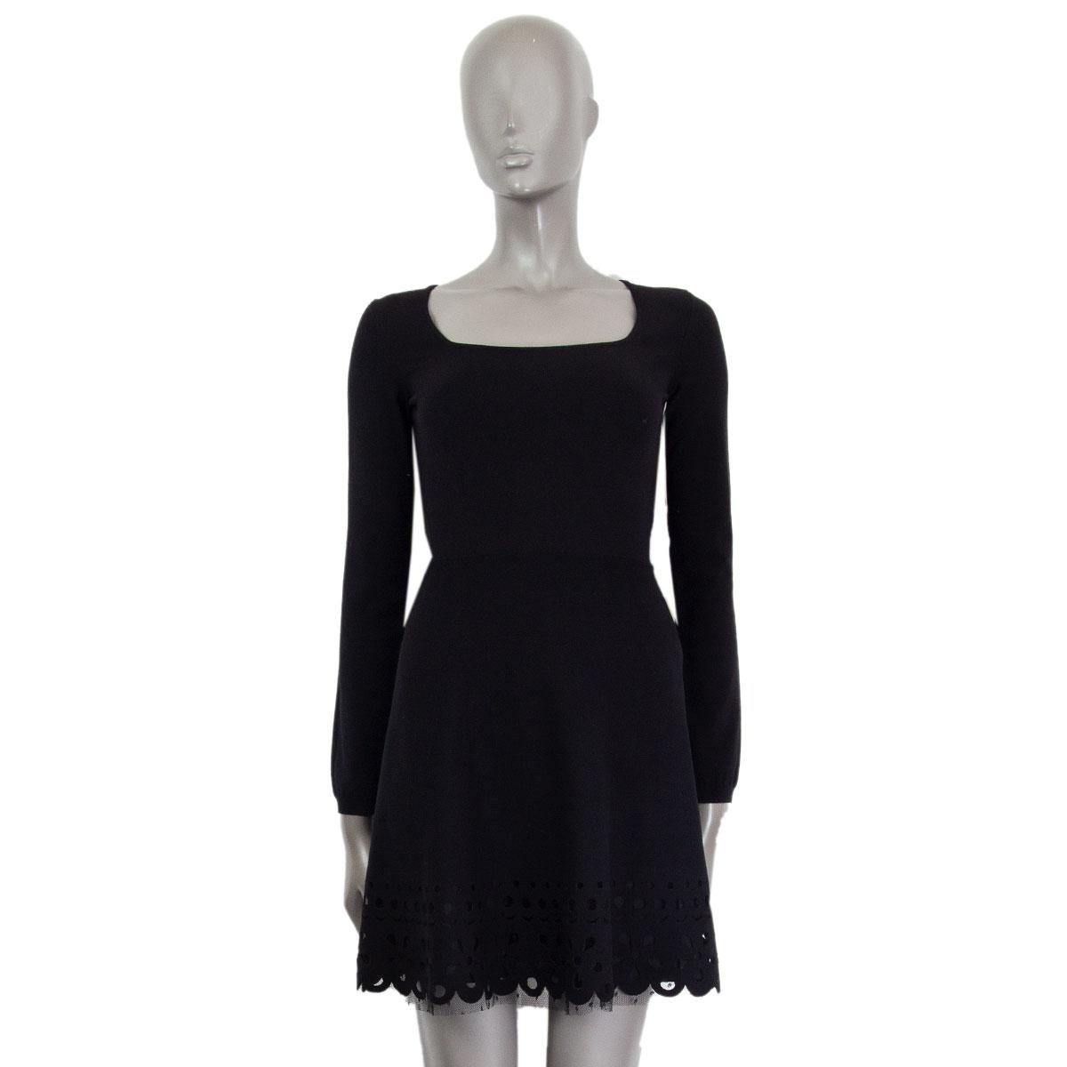 R.E.D. By Valentino long sleeve a-line knit dress in black viscose (70%) and polyester (30%) with a square neckline and a cut-out hem with mesh detail. Closes partially on the side. Lined in cotton (100%). New.

Tag Size XS 
Size XS
Shoulder Width