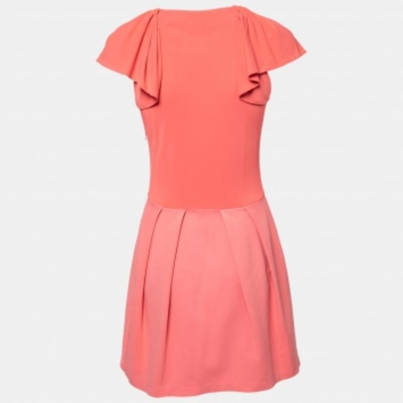 Added with a bow accent to the elegant silhouette, the dress from RED Valentino makes for an amazing choice on any day. The coral pink dress can be styled with heels or flats.