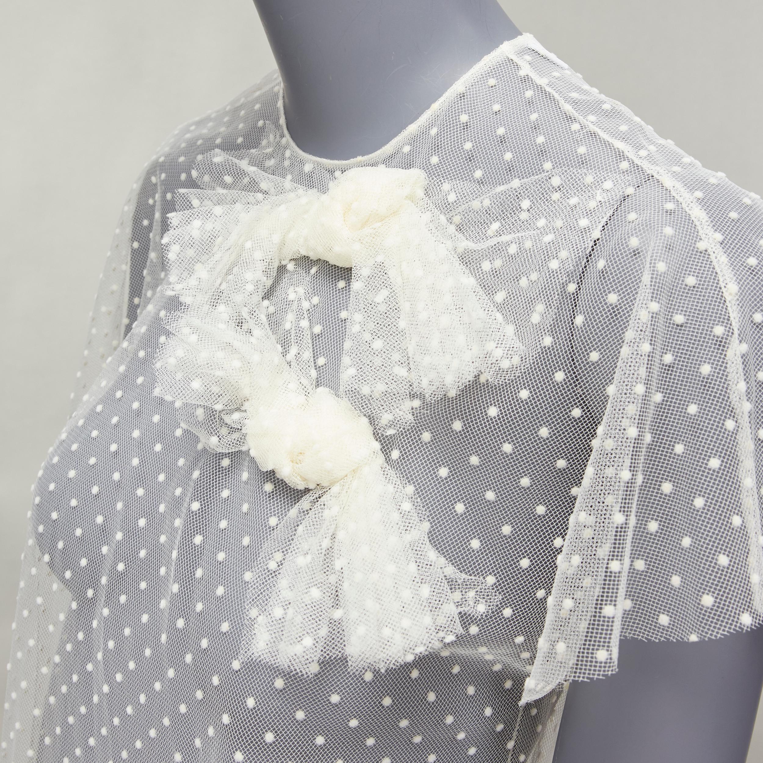 RED VALENTINO cream polka dot lace asymmetric bow collar sheer top IT38 XS
Reference: KYCG/A00008
Brand: Red Valentino
Material: Polyamide, Blend
Color: Cream
Pattern: Polka Dot
Closure: Zip
Extra Details: Back zip.
Made in: