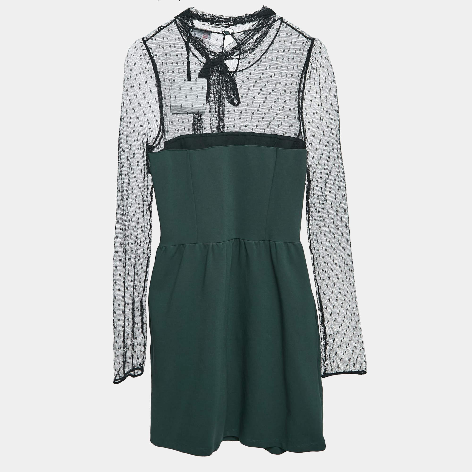 This designer dress is a chic and stylish garment that exudes elegance and sophistication. With its sleek design flattering silhouette and high quality craftsmanship this dress is perfect for any special occasion or evening event ensuring you stand