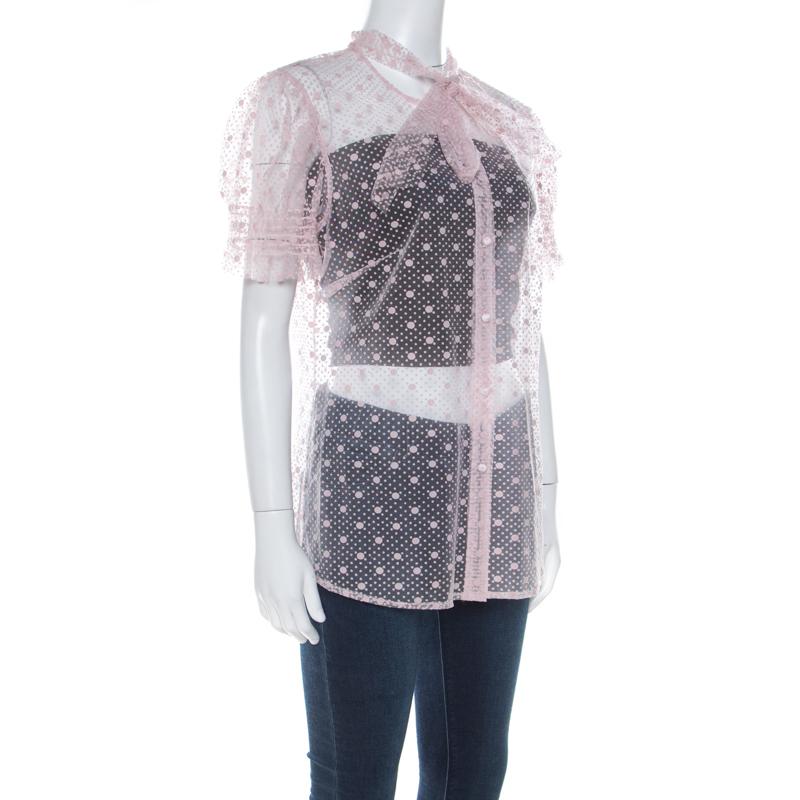 How elegant is this blouse from Red Valentino! The pink tulle blouse features a dotted pattern all over and flaunts a stylish bow tie detailing, long sleeves and button closures at the front. Sure to look amazing on you, it can be paired well with a