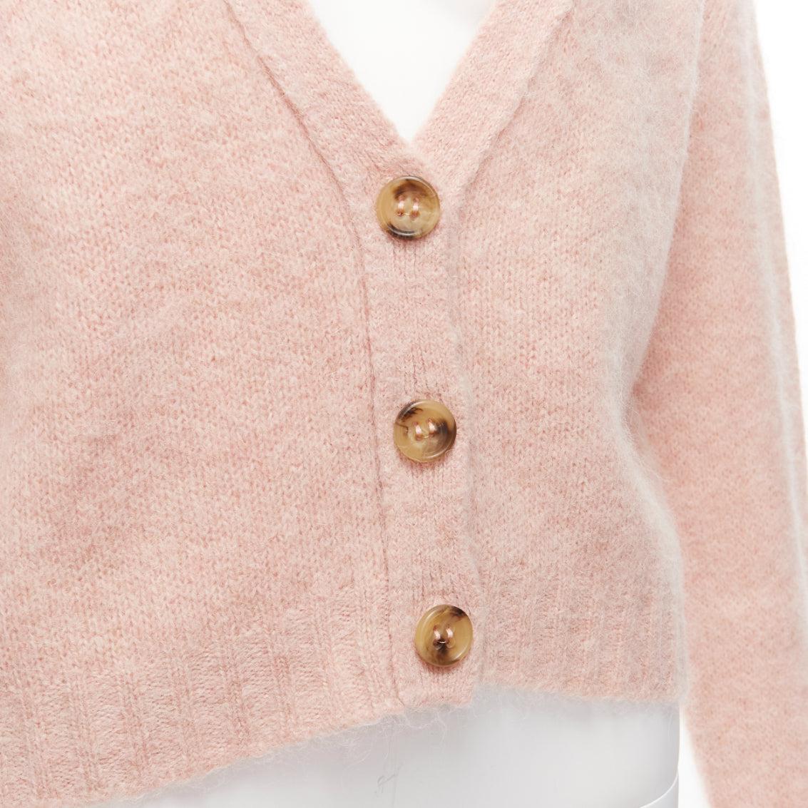 RED VALENTINO pink alpaca blend horn button cardigan sweater XS
Reference: KYCG/A00021
Brand: Red Valentino
Material: Acrylic, Alpaca, Blend
Color: Pink
Pattern: Solid
Closure: Button
Made in: Romania

CONDITION:
Condition: Excellent, this item was