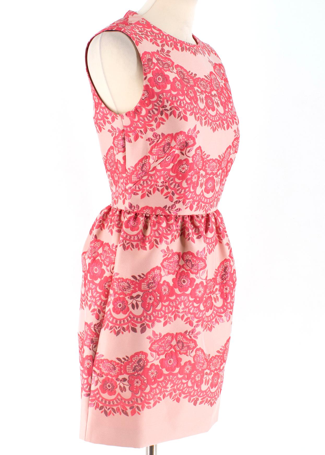 Red Valentino Pink Floral-pattern Jacquard Mini Dress 

- Sleeveless and high neck-line
-Unlined
- Back fastening zip 
- A-line skirt 

Please note, these items are pre-owned and may show signs of being stored even when unworn and unused. This is