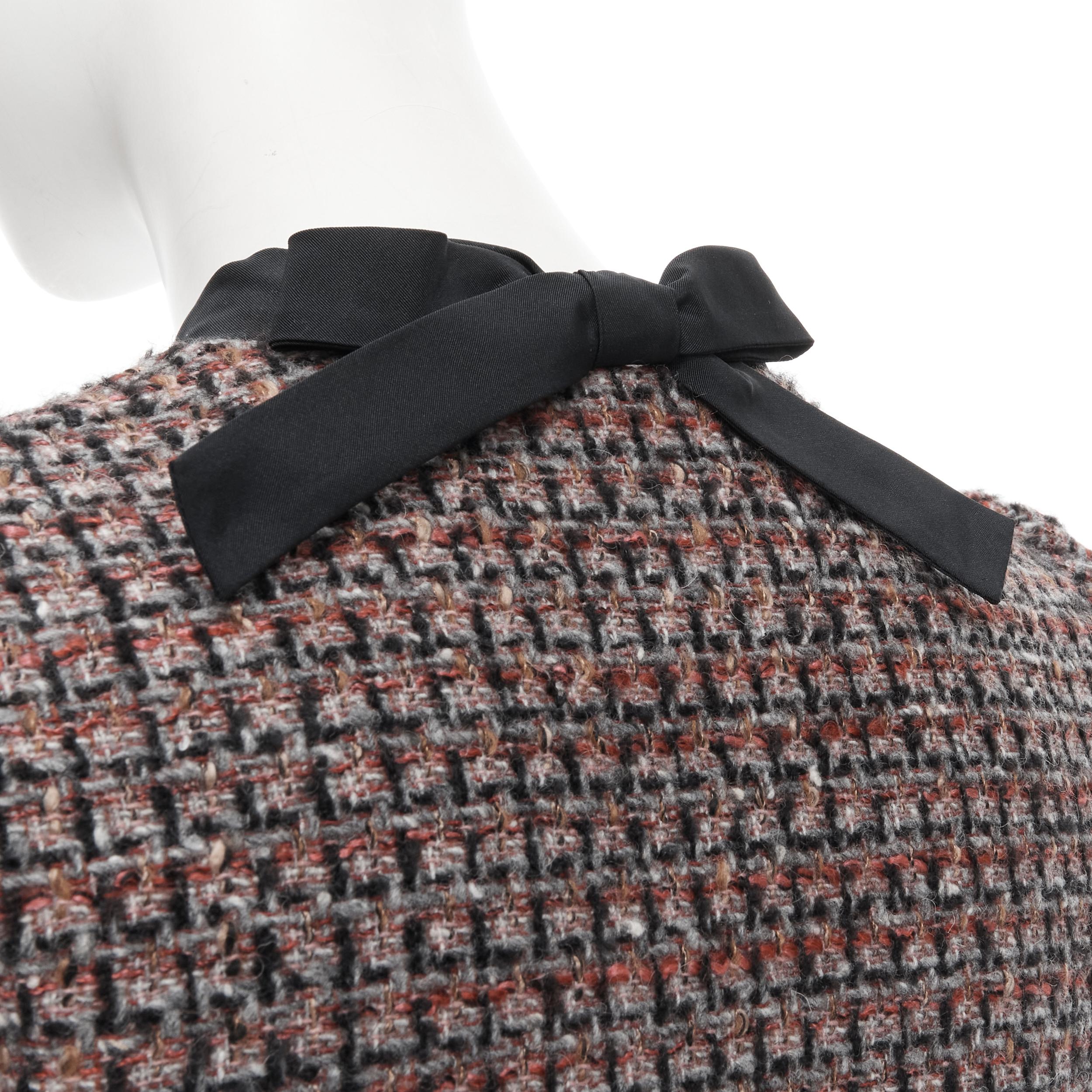 RED VALENTINO red grey wool tweed black ruffle trim jacket skirt set 
Reference: JECN/A00009 
Brand: Red Valentino 

CONDITION
Condition: Good

SIZING: 
Designer Size: International XS 
Size Reference: US0 / UK6 / IT38 / FR34 / XXS-XS