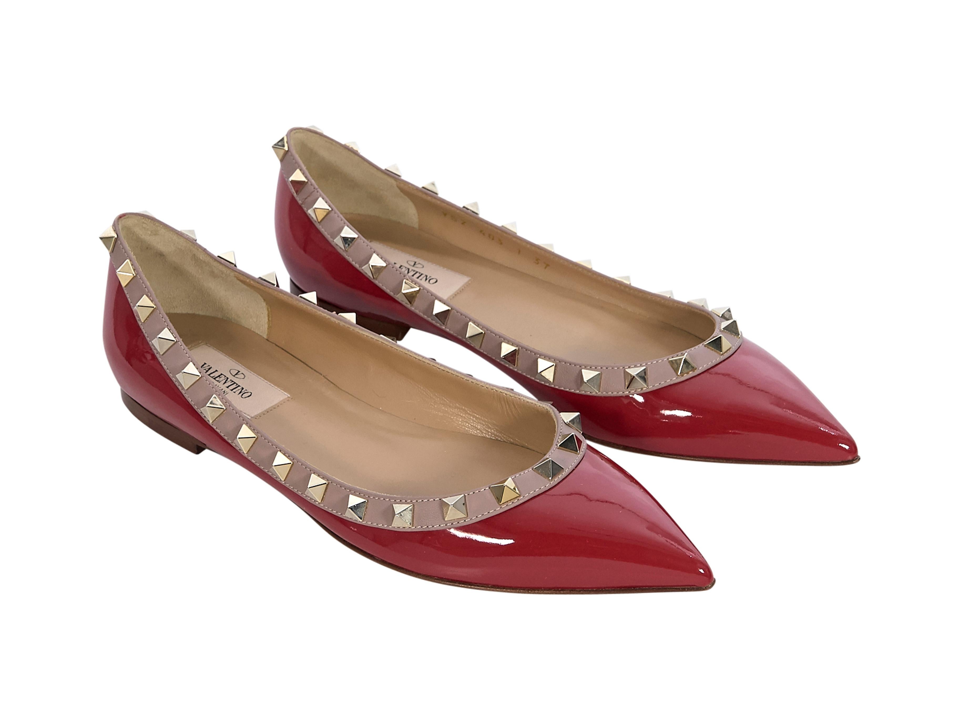 Product details:  Red patent leather Rockstud flats by Valentino. Gold-tone studs. Contrast leather trim. Pointed-toe. Slip-on style. Brand size FR 37. Style with cropped light-wash denim. 