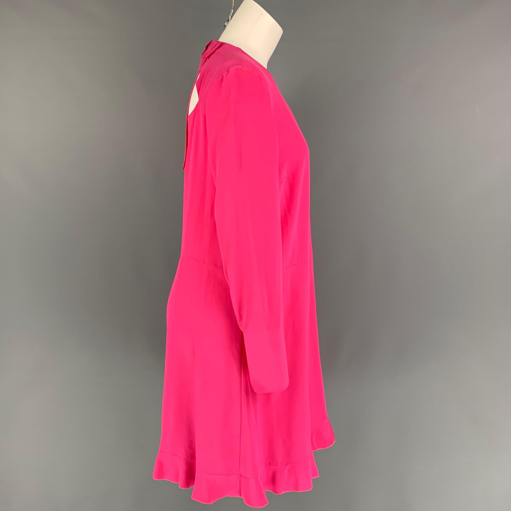 RED VALENTINO dress comes in a pink silk featuring an a-line style, ruffled hem, long sleeves, back bow detail, and a snap button closure. 

Very Good Pre-Owned Condition.
Marked: 42

Measurements:

Shoulder: 14 in.
Bust: 34 in.
Waist: 36 in.
Hip: