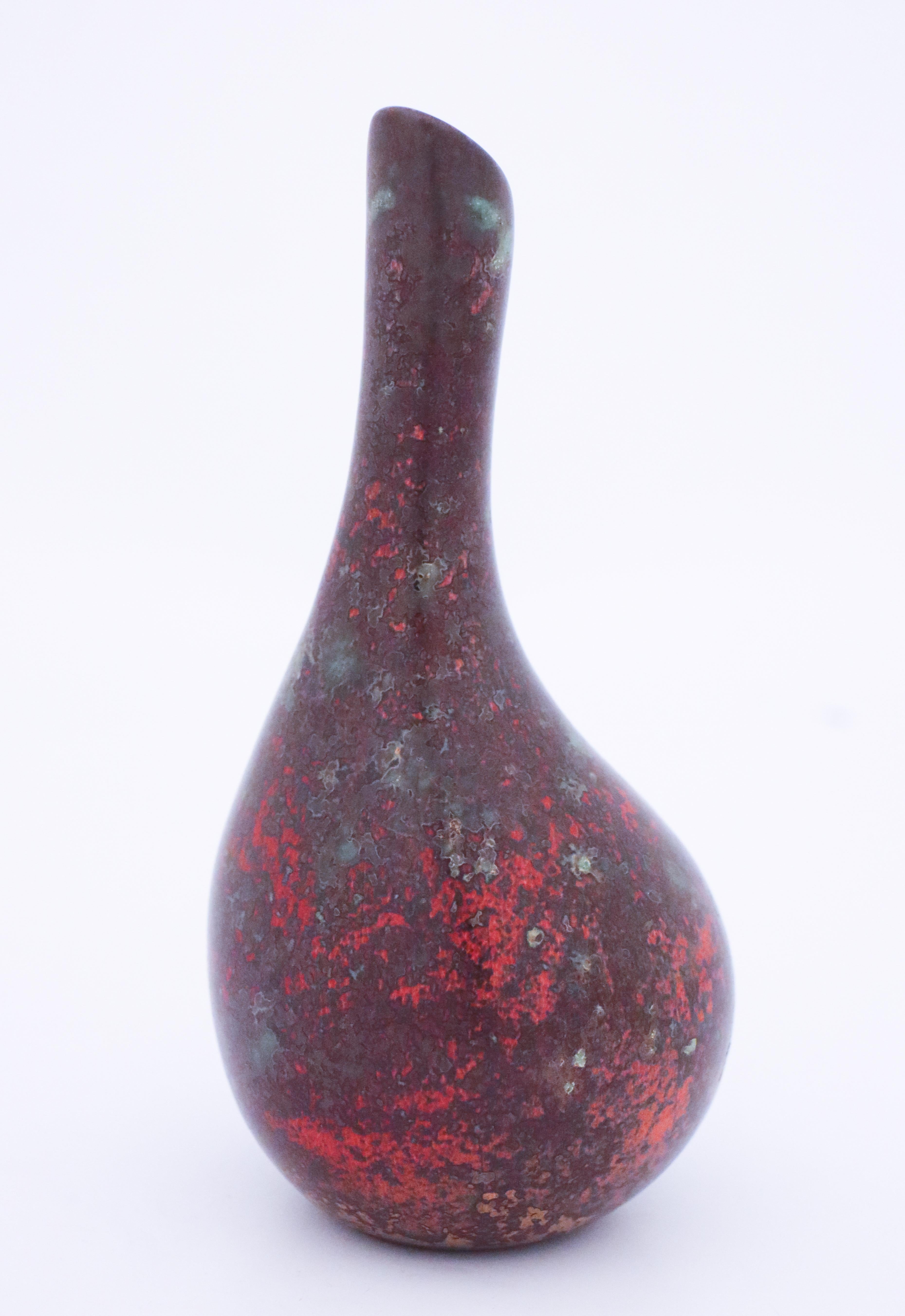 A red vase designed by Hans Hedberg in his studio in Biot. The vase is 18 cm high and in very good condition except from some minor marks and scratches. 

Hans Hedberg (1917-2007) Swedish ceramist who had his studio in Biot, near Nice in