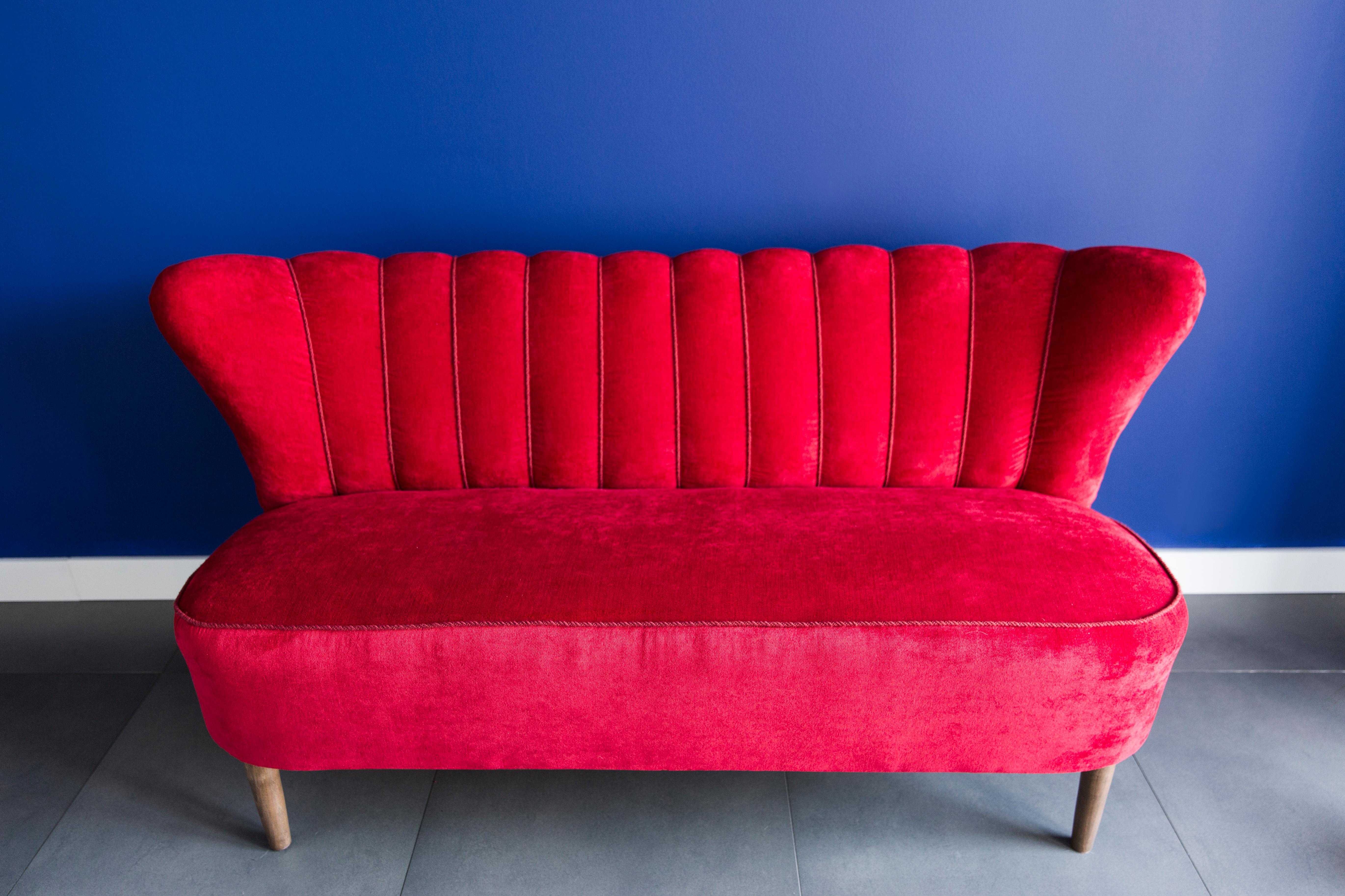 Beautiful club sofa from the 1960s, produced in Germany, at the moment they are unique. Due to their dimensions, they perfectly blend in even in small apartments providing comfort and beautiful decoration. Covered with high-quality velvet fabric, a