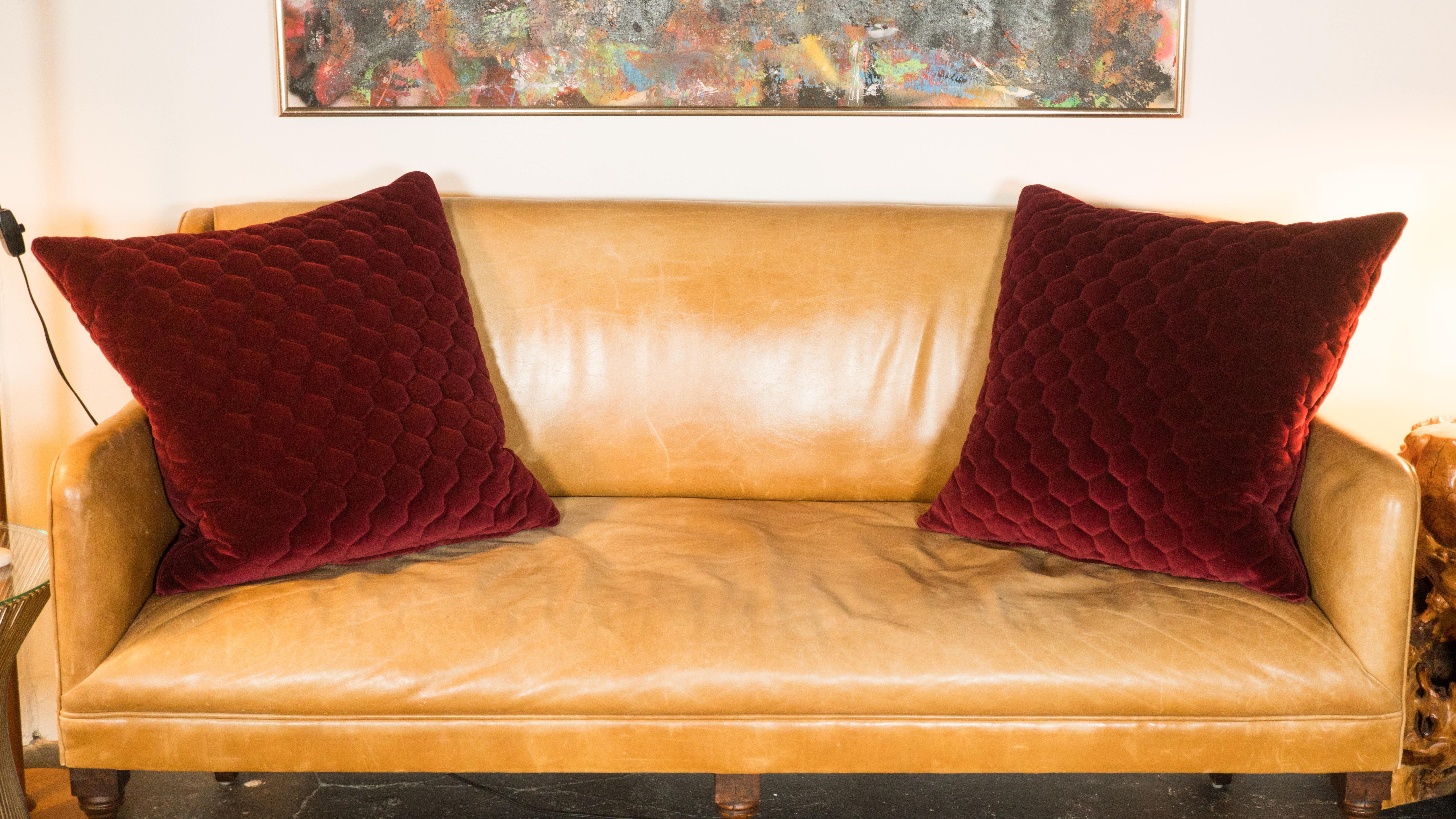 Pair of delightful handmade red velvet pillows, circa 2015. Custom order to match a pair of B&B Italia Musa chairs, these pillows were rarely used and made to provide a bit of extra back support. Down feather filled and interior of velvet is padded,