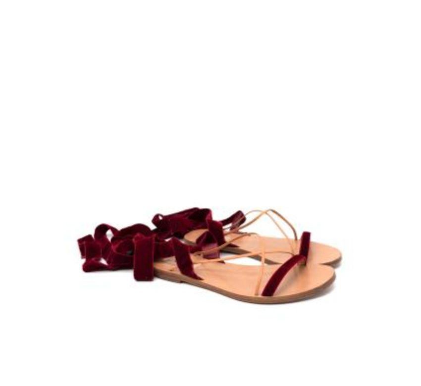 Valentino Red Velvet Lace-Up Sandals
 
 - Red velvet ankle wrap sandals
 - Nude leather narrow crossover stap
 - Leather sole 
 
 Materials 
 Velvet 
 Leather
 
 Made In Italy 
 
 9.5 
 Excellent Condition 
 
 PLEASE NOTE, THESE ITEMS ARE PRE-OWNED