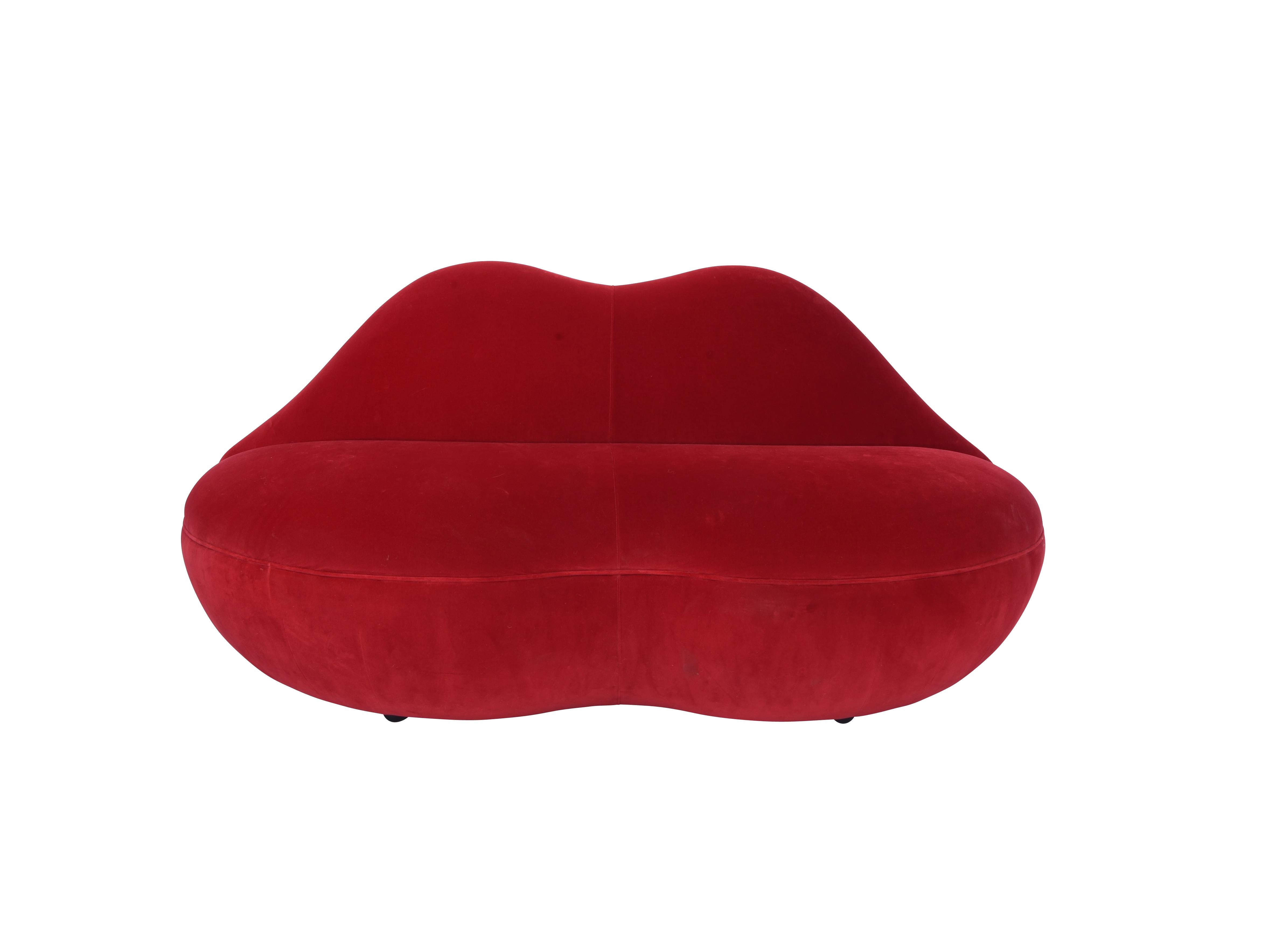 Original concept was a 1937 surrealist sofa by Salvador Dalí, modeled after the lips of actress Mae West. This design inspired 1960s pop culture to produce 