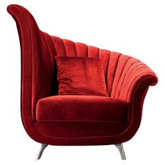 Fauteuil à coquille en velours rouge