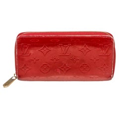 Red Vernis leather Louis Vuitton Zippy wallet with gold-tone hardware