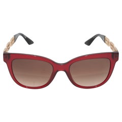 Occhiali da sole Versace rossi in acetato e metallo dorato